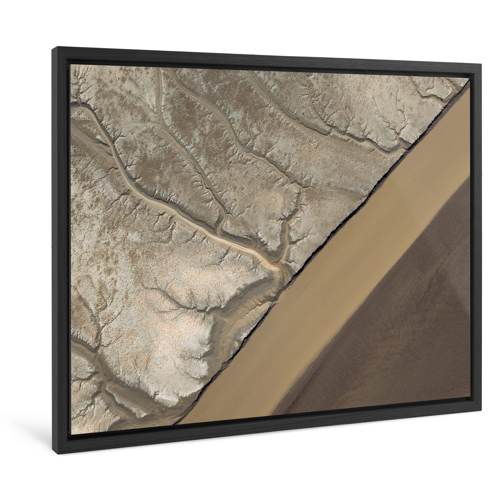 Framed photo print of aerial view of meandering tidal channels and exposed terrain