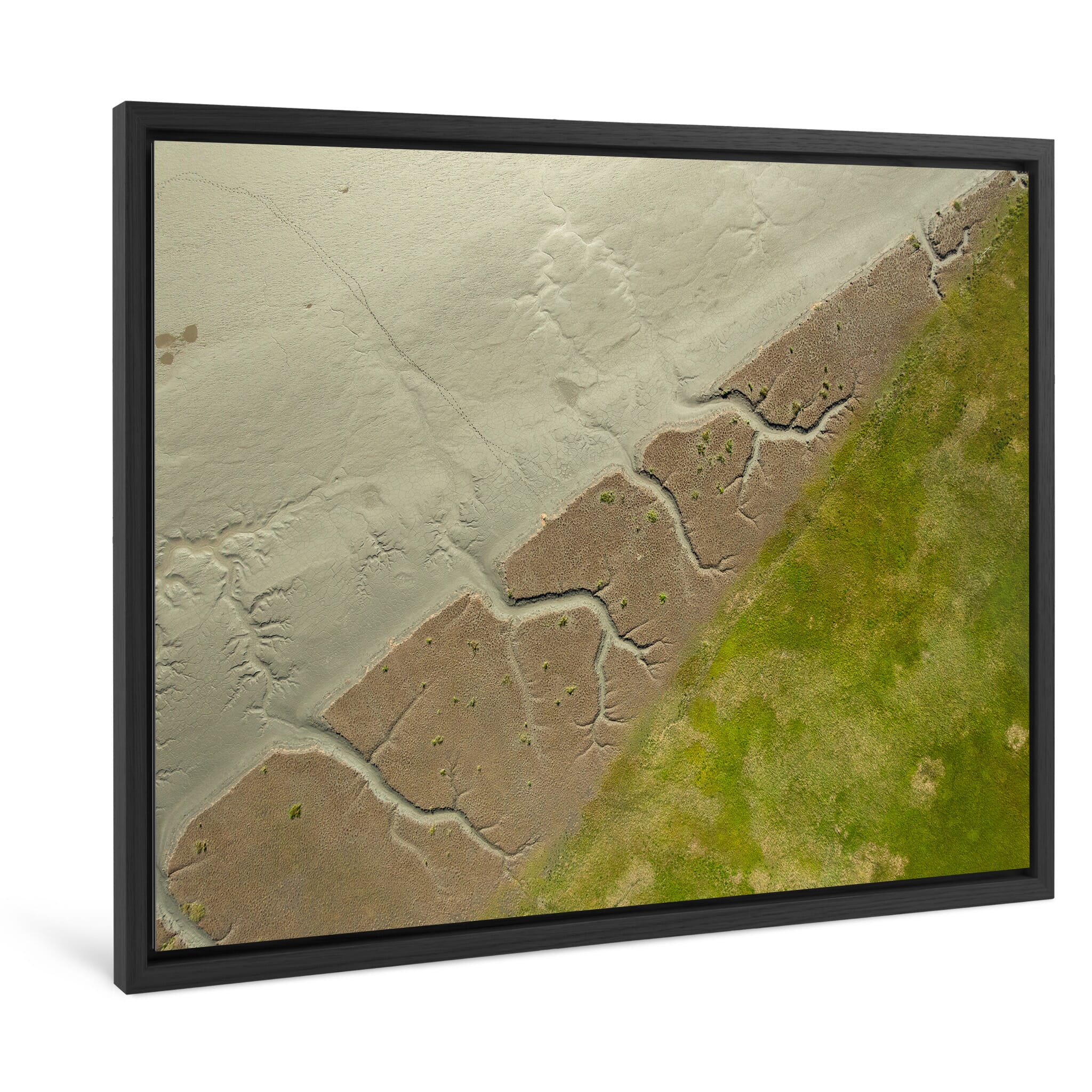 Framed photo print of winding tidal channels through coastal terrain
