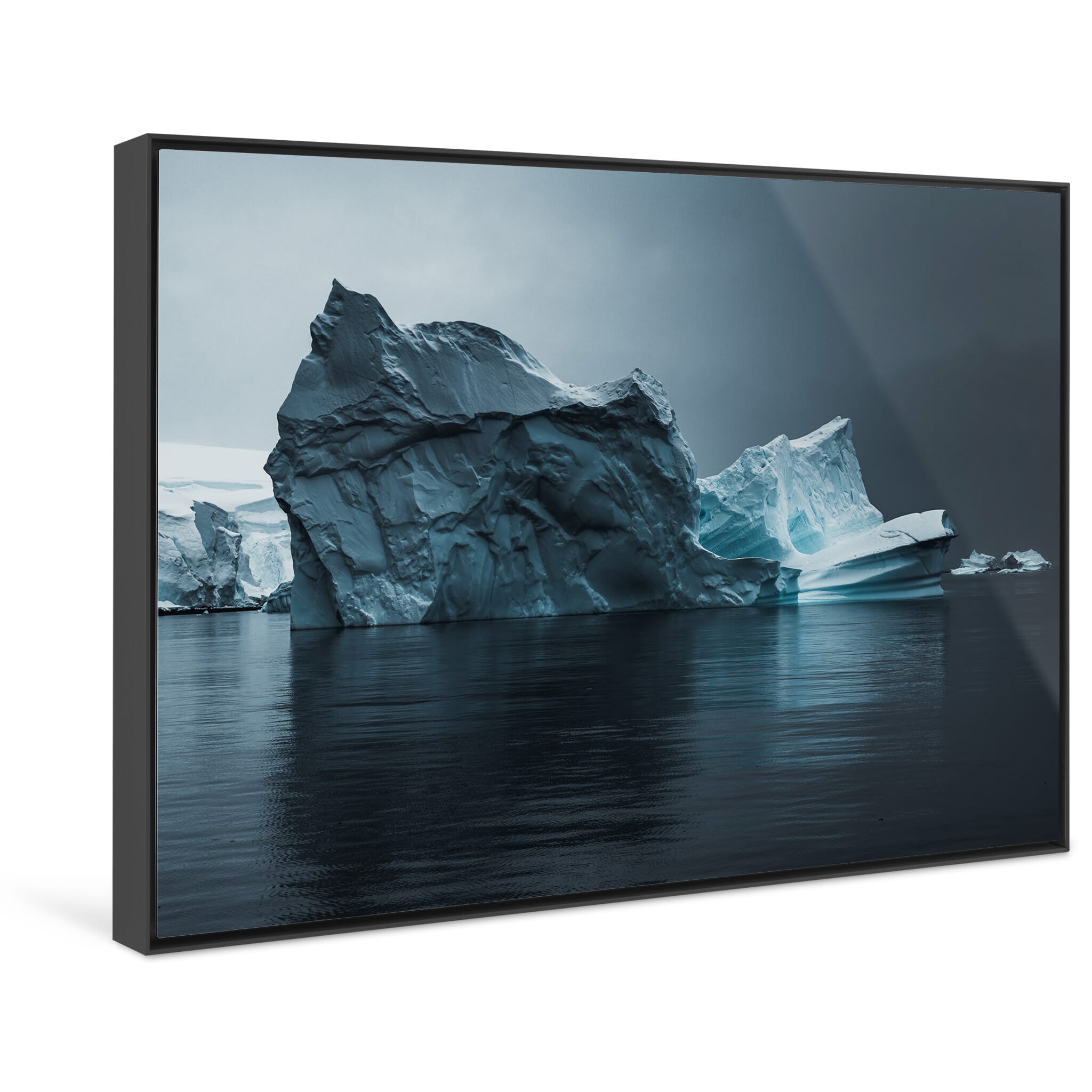 Framed photo print of varied tones from deep blue to bright white on an iceberg