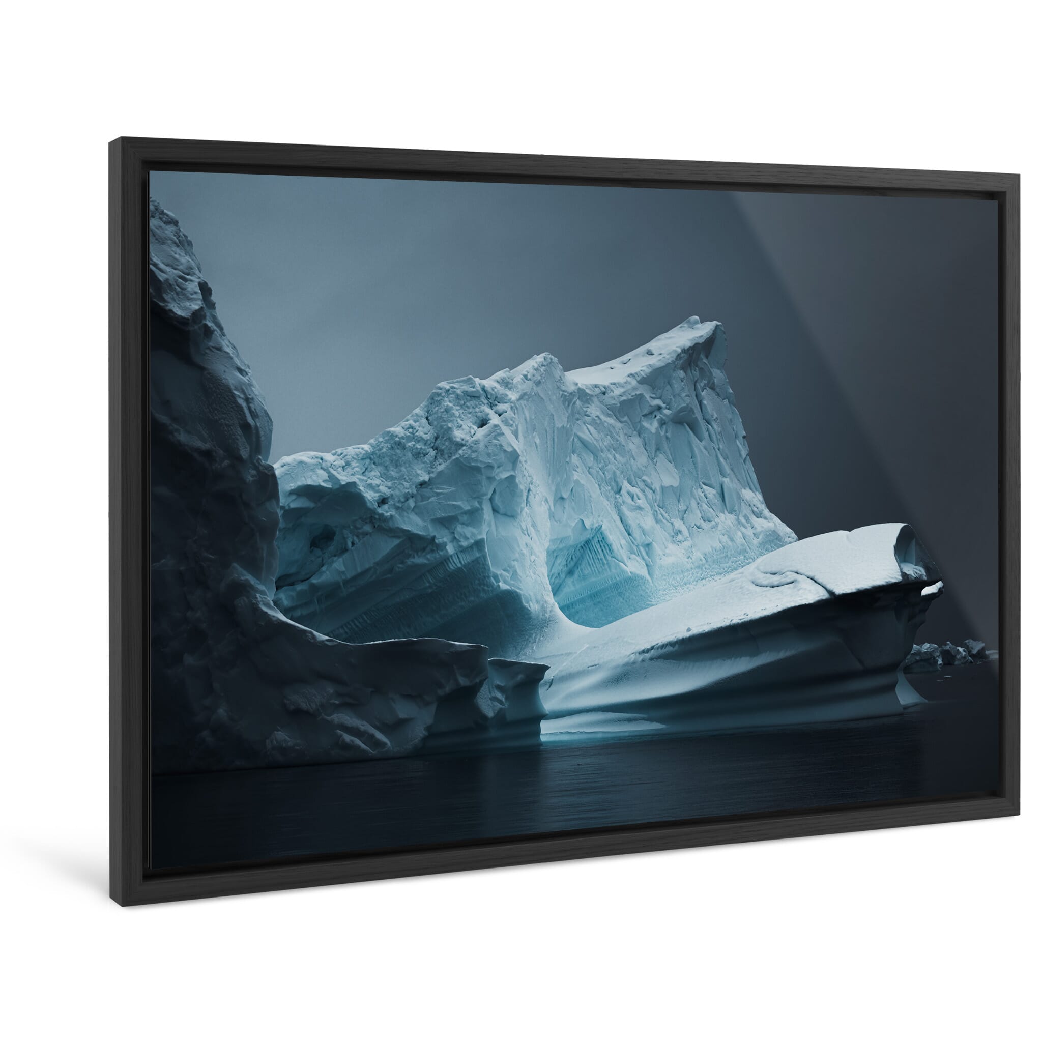 Framed photo print of a large iceberg featuring carved channels and smooth surfaces