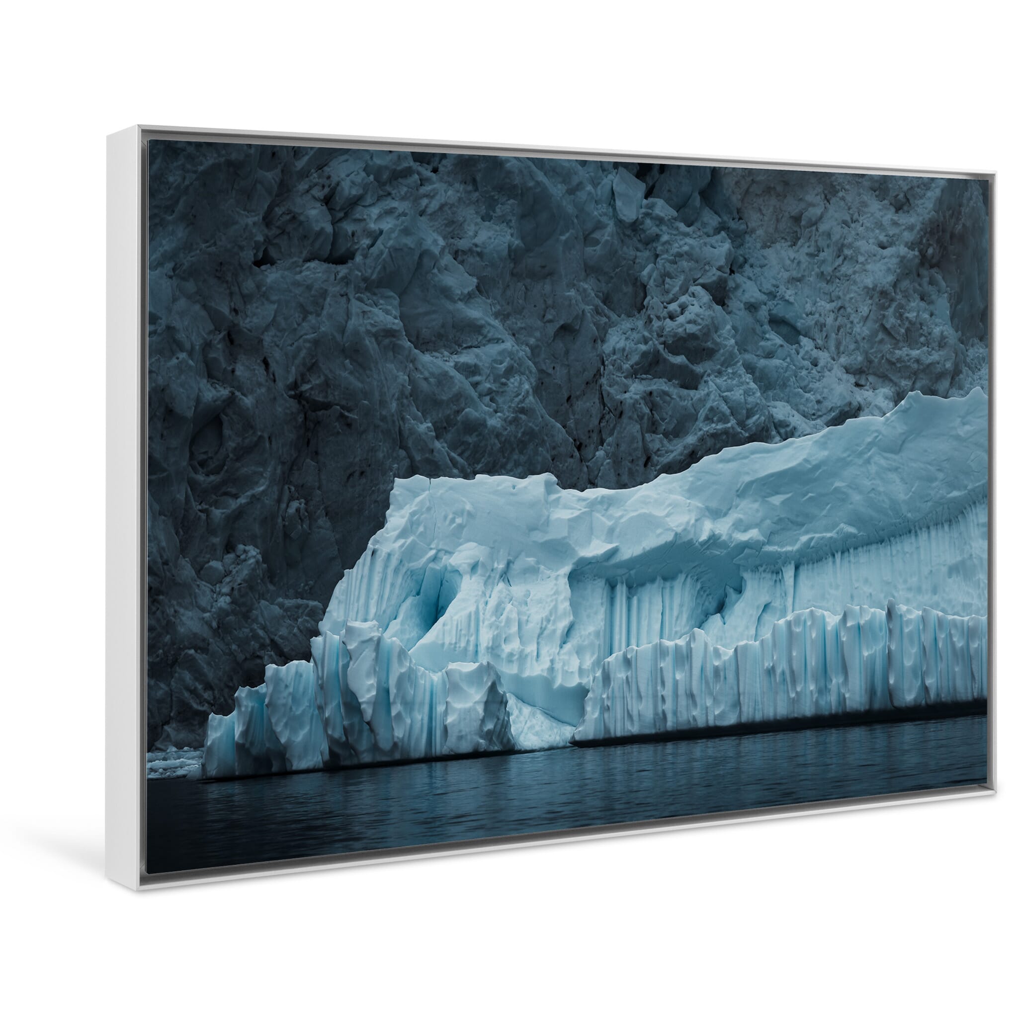 Framed photo print of a massive ice block revealing jagged edges and smooth surfaces