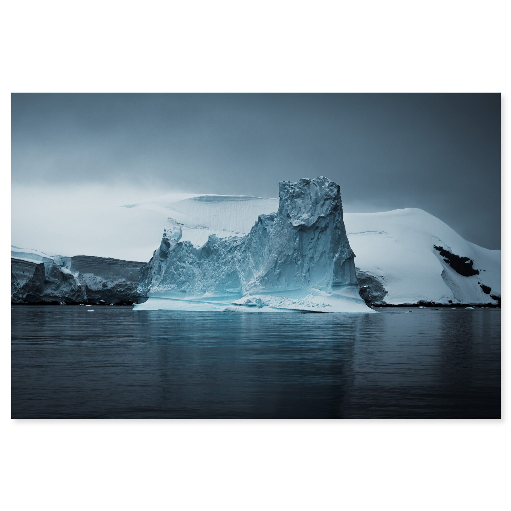 Fine art print of an Antarctic iceberg with deep ridges and smooth surfaces