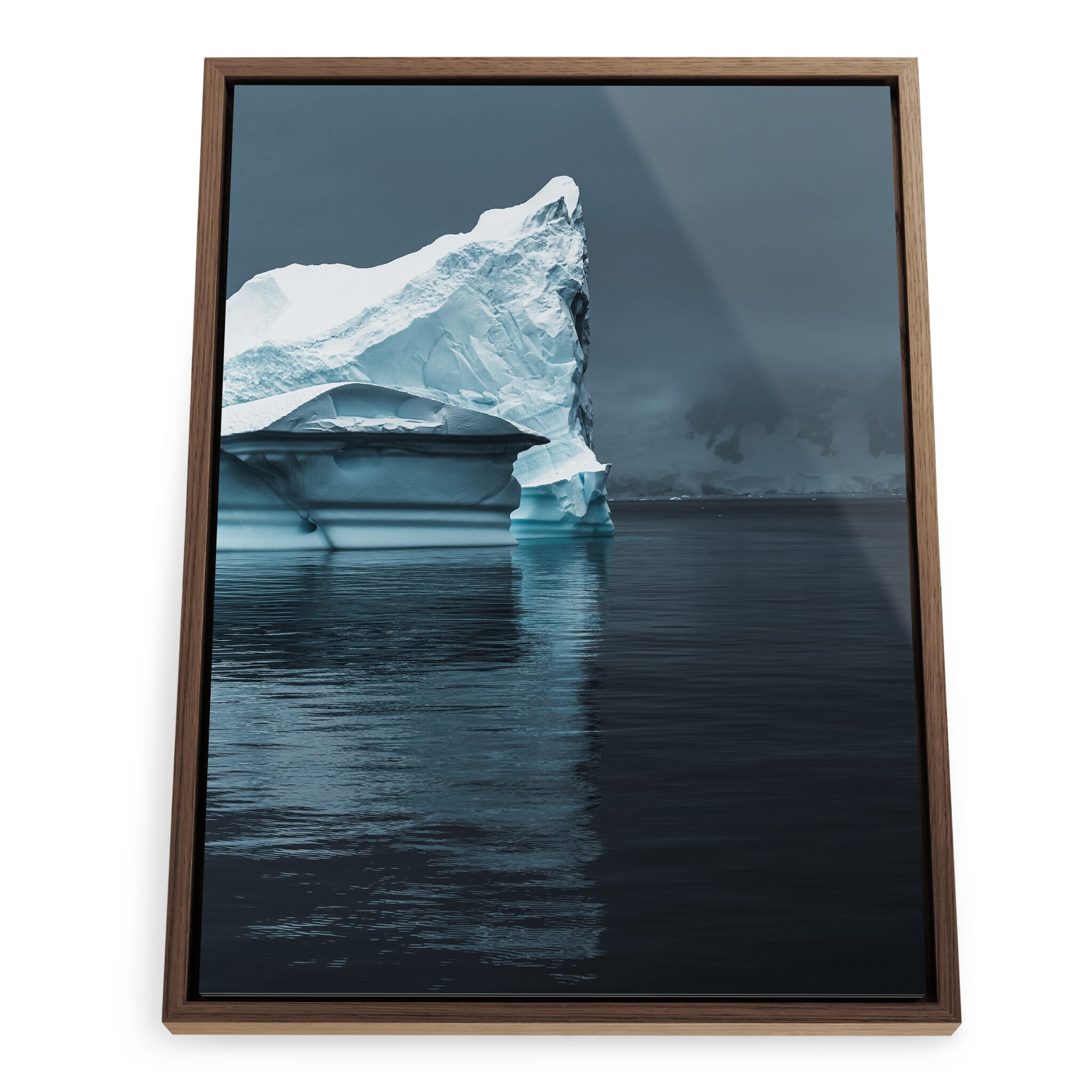 Framed photo print of curved blue-white iceberg with deep surface lines