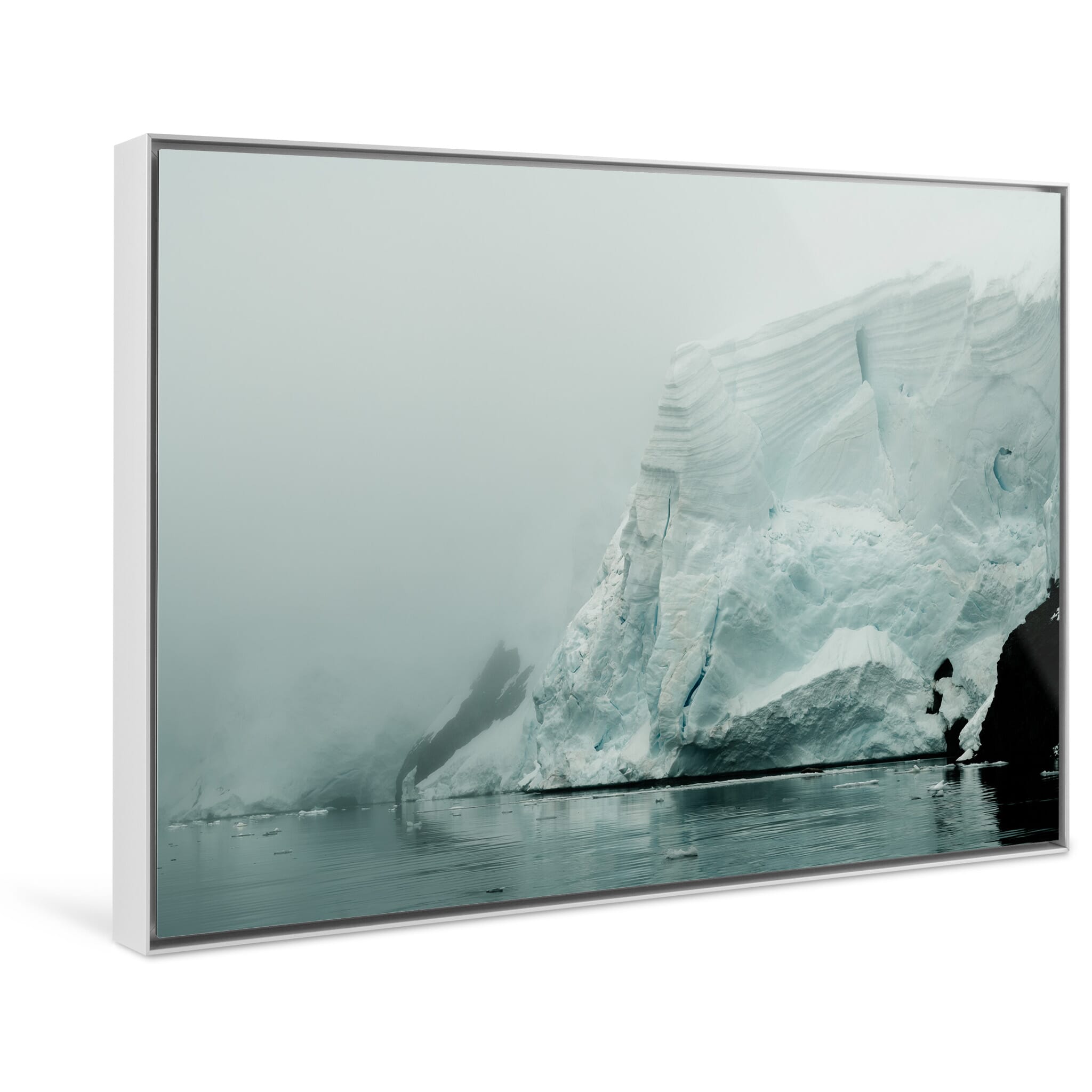 Framed photo print of a remote Antarctic scene capturing the scale of icebergs