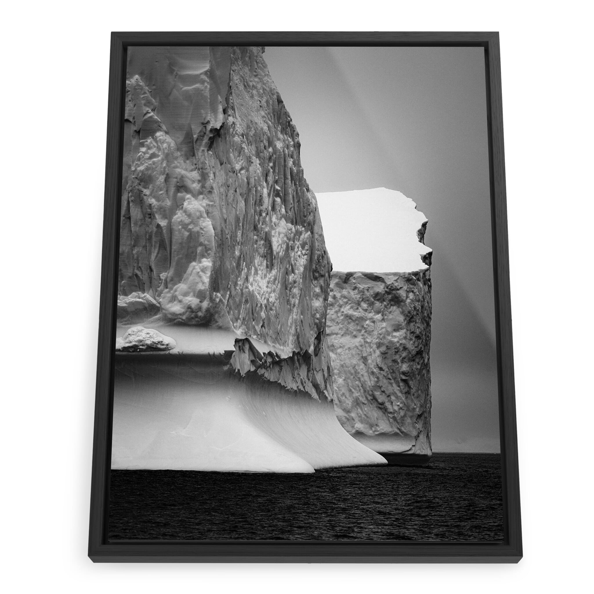 Framed photo print of two massive icebergs with sculptural forms