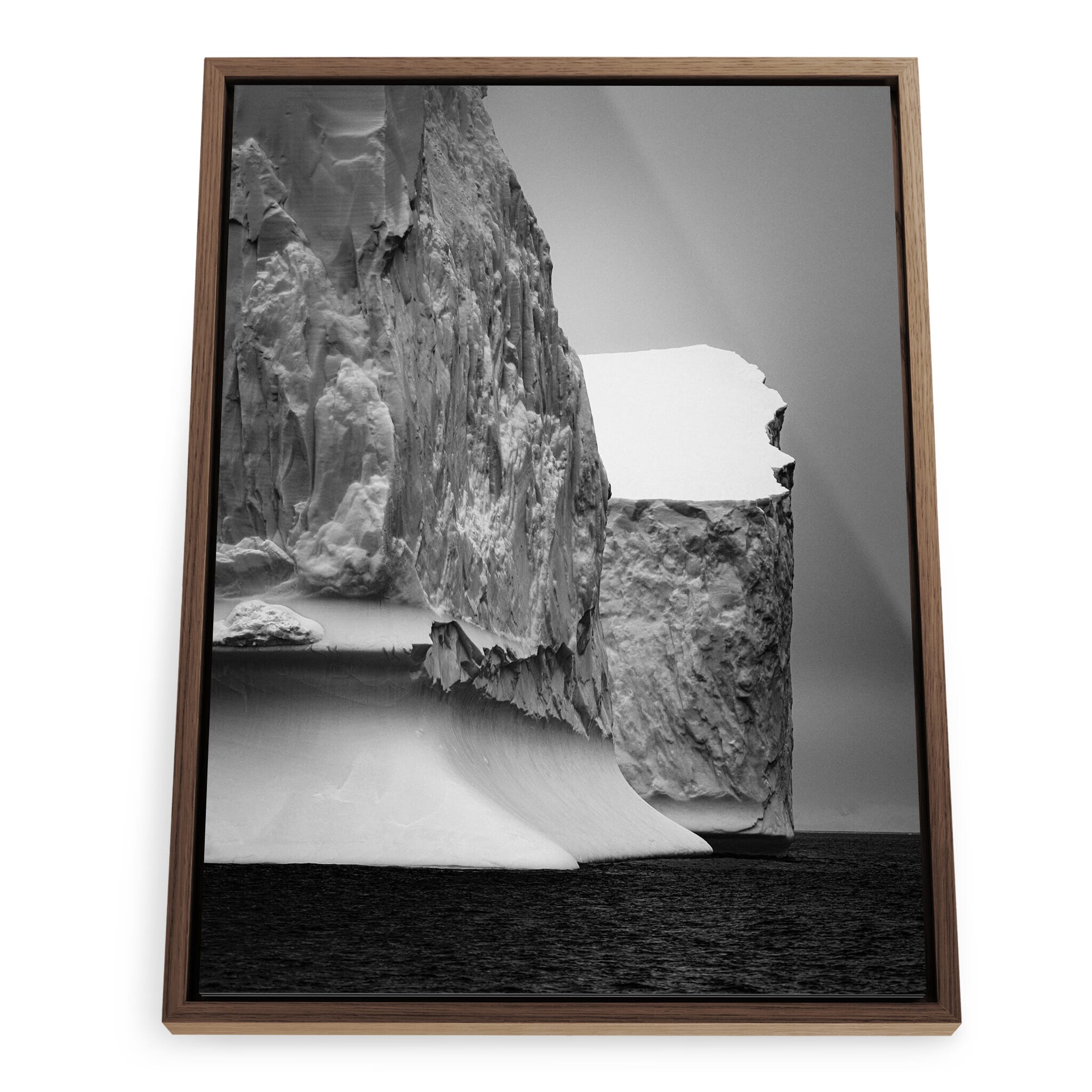 Framed photo print of large drifting icebergs in dark waters