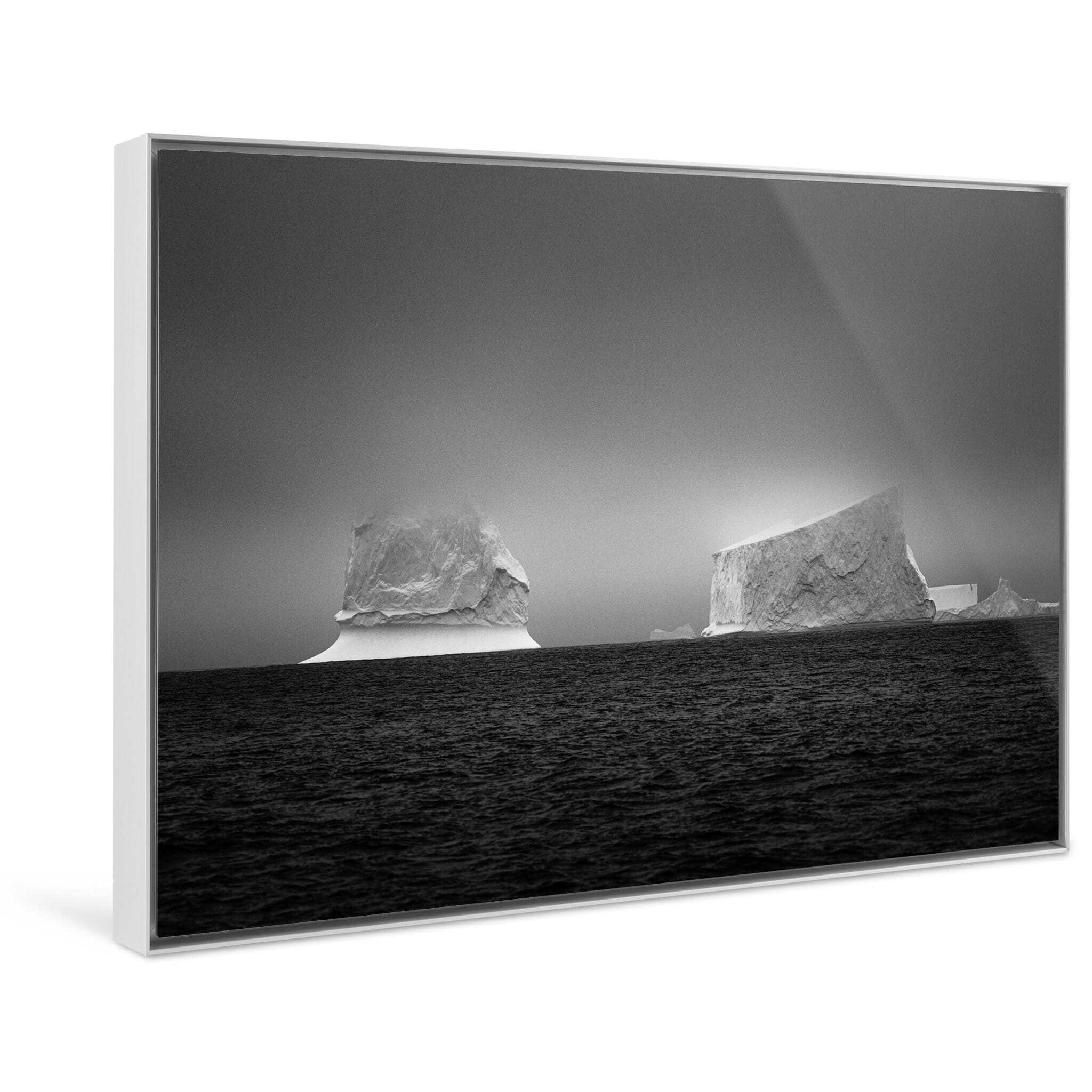 Framed photo print of two icebergs illustrating the stark beauty of Antarctica