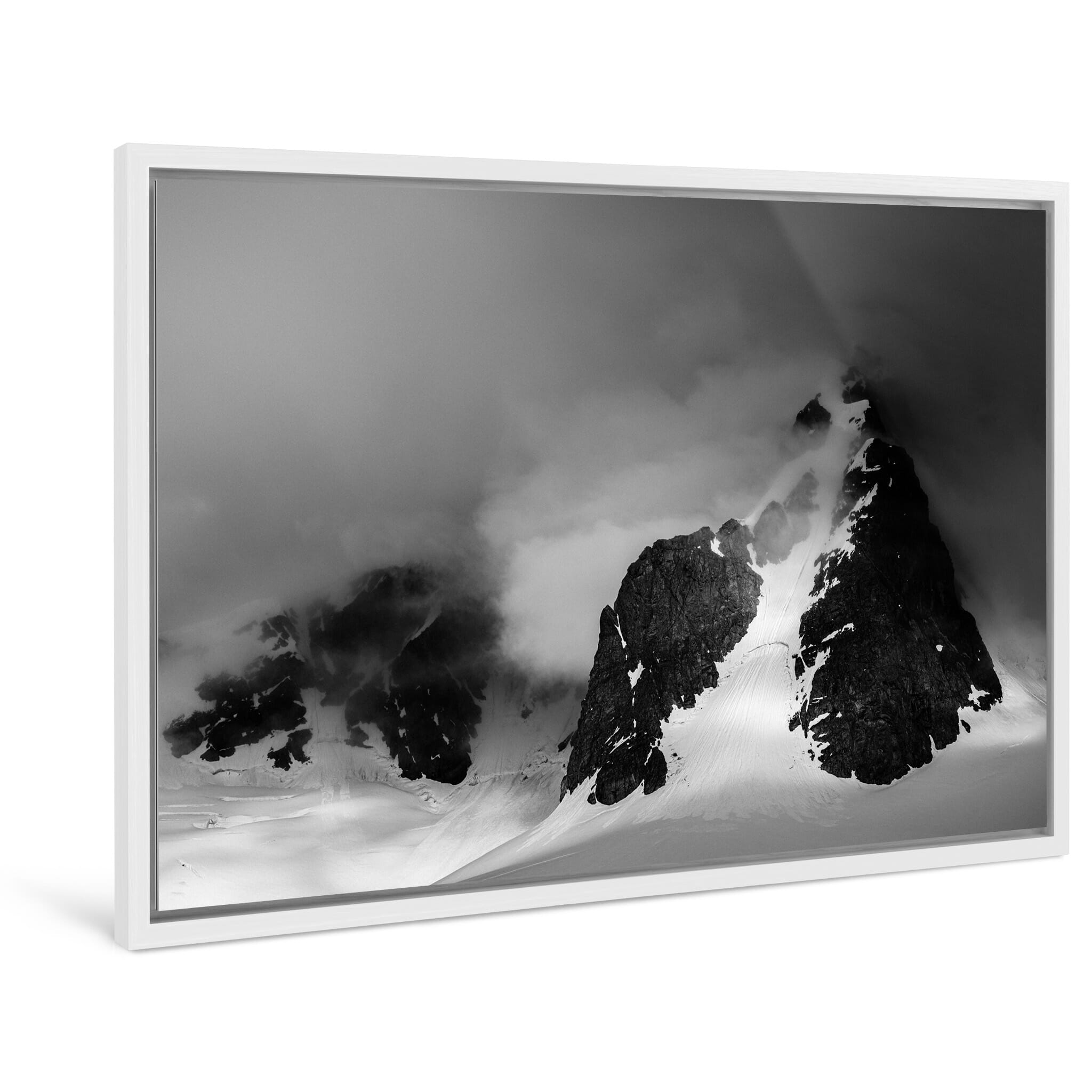 Framed photo print of rugged Antarctic peaks with bold light and shadow