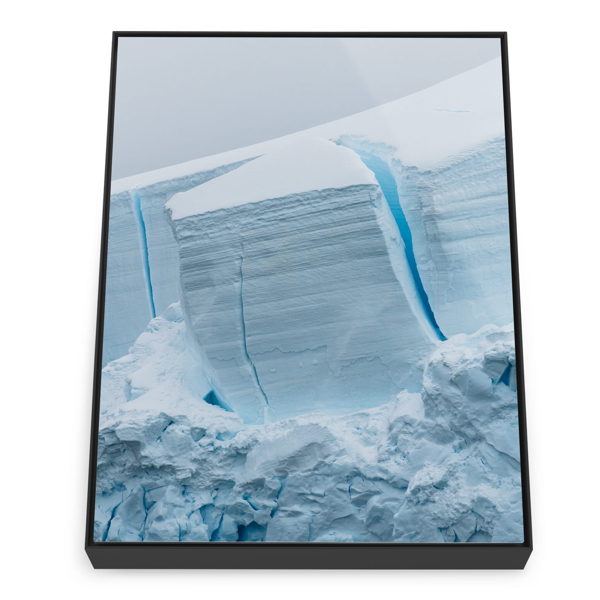 Framed photo print of blue-toned crevasses in Antarctic ice