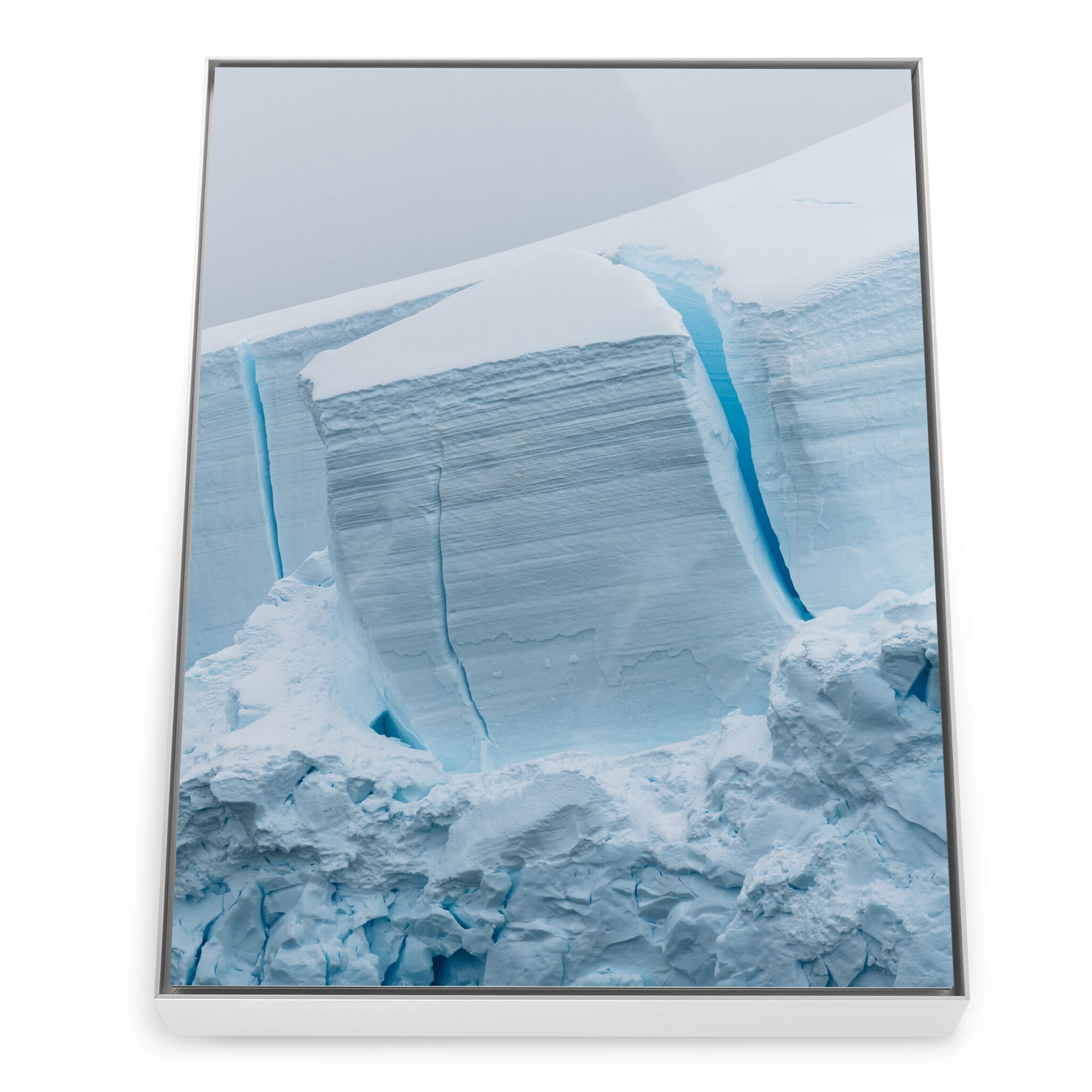 Framed photo print of abstract ice surface shaped by melt and pressure