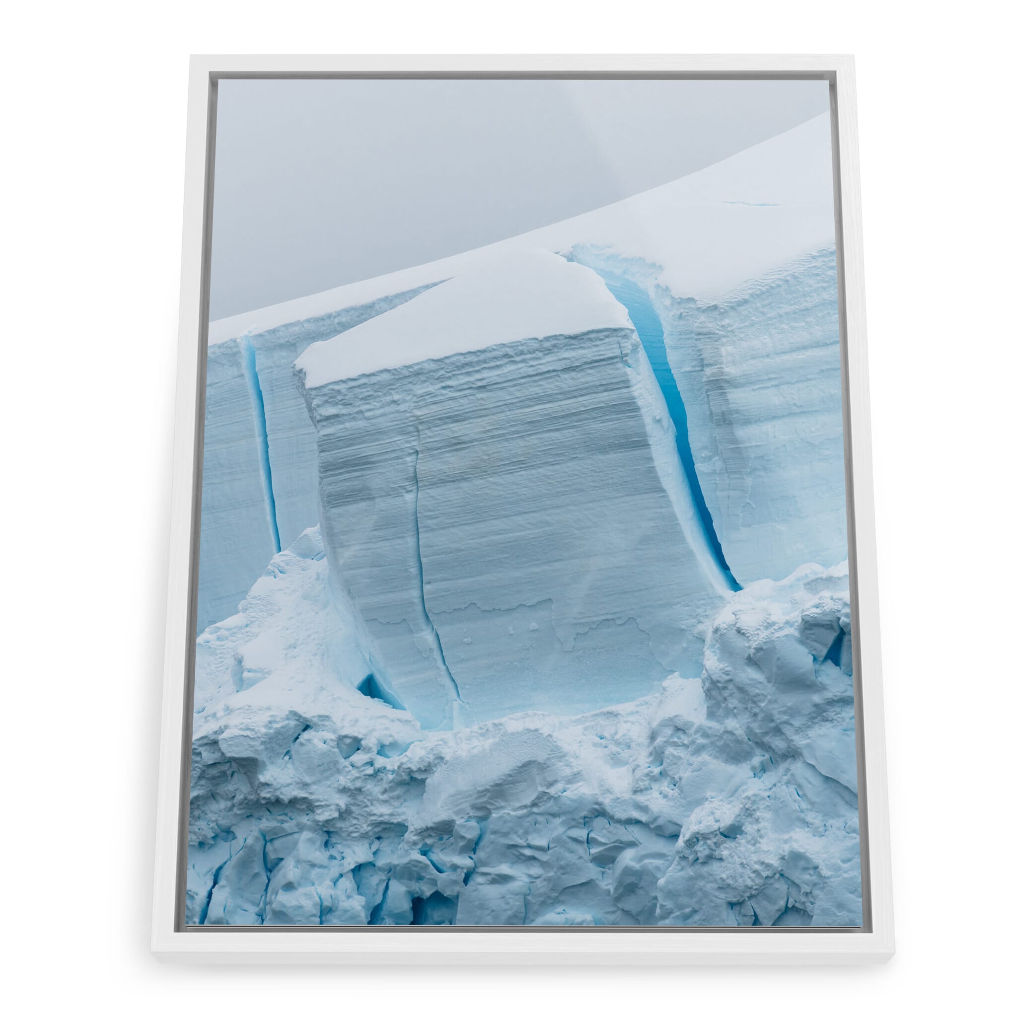 Framed photo print of layered ice formations with deep shadows