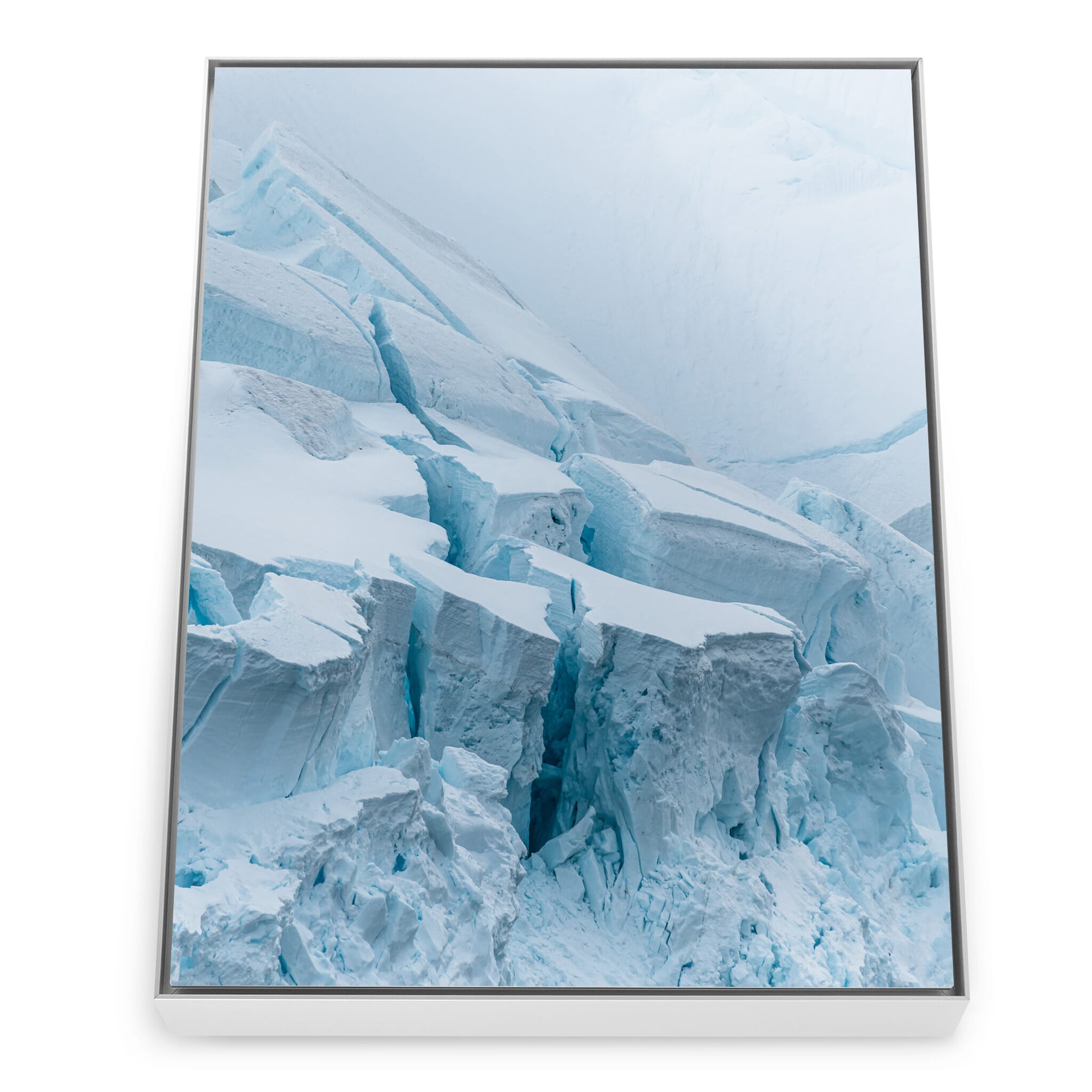 Framed photo print of deep cracks and ridges across a frozen glacial surface