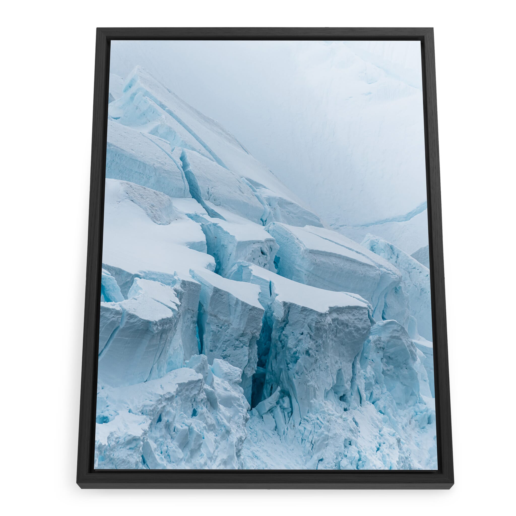 Framed photo print of narrow glacier crevasses with deep blue shading