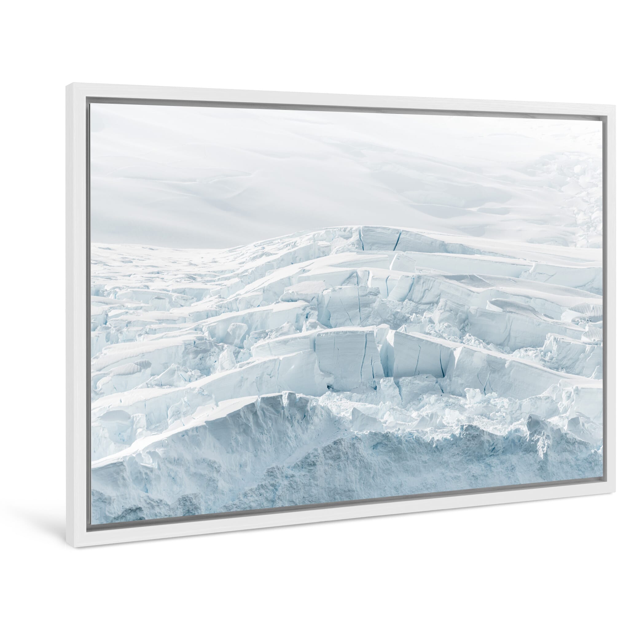 Framed photo print of near-monochrome ice scene revealing deep glacier cracks
