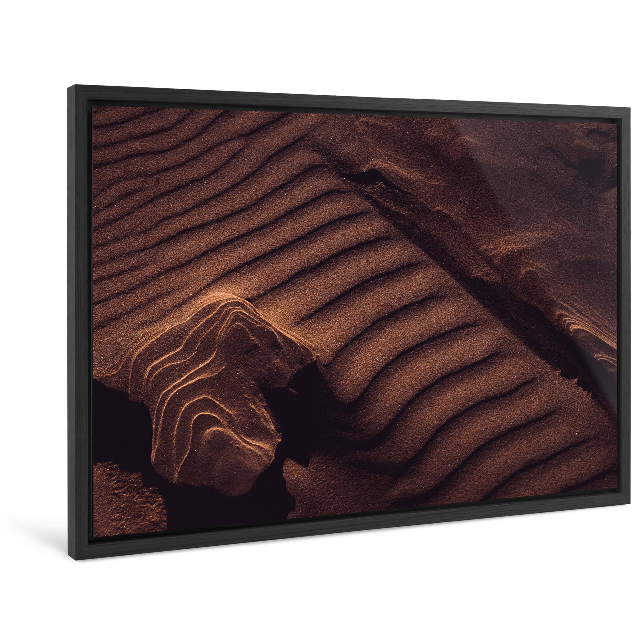 Framed photo print of layered sand formations shaped by wind and light