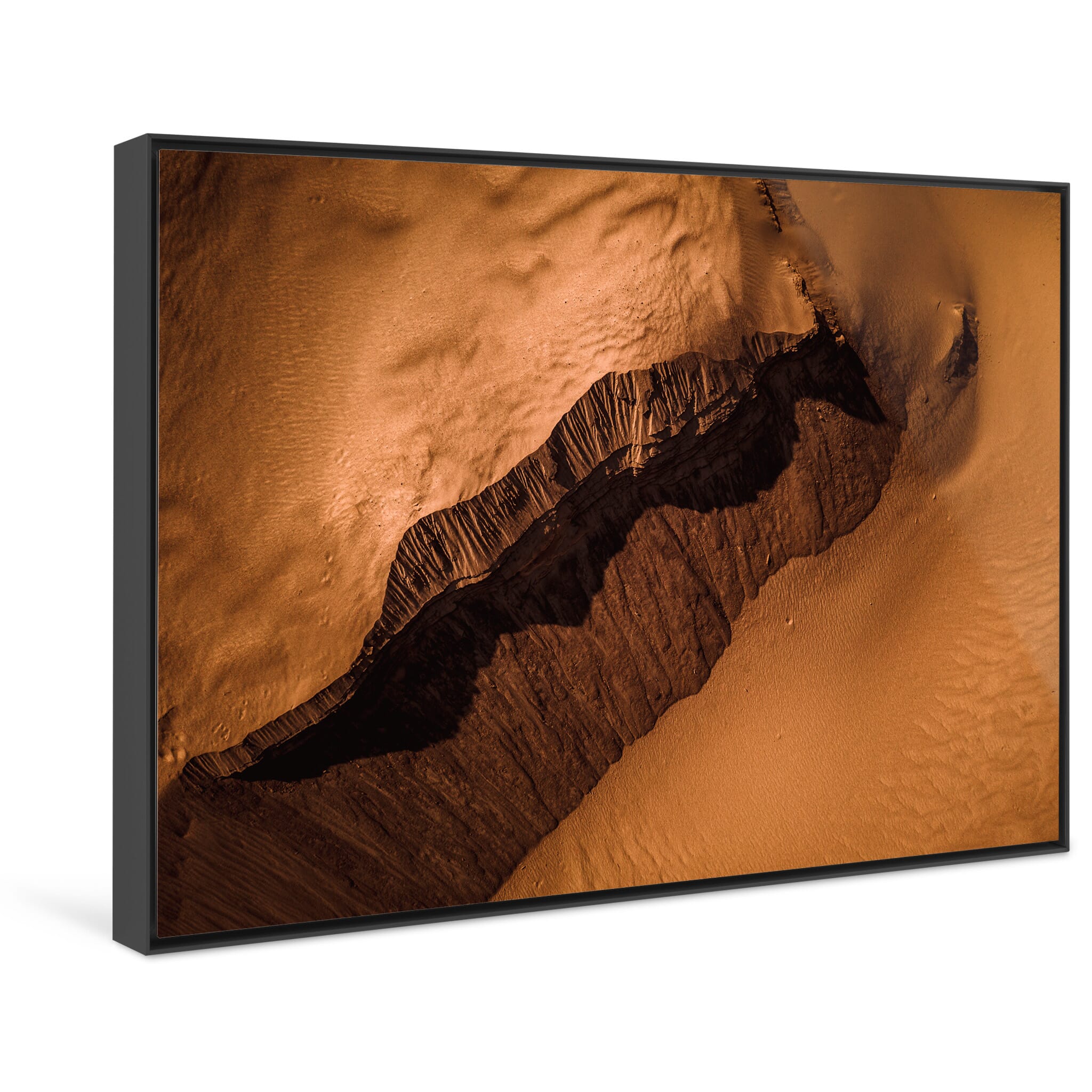 Framed photo print of quiet surfaces reminiscent of remote terrains
