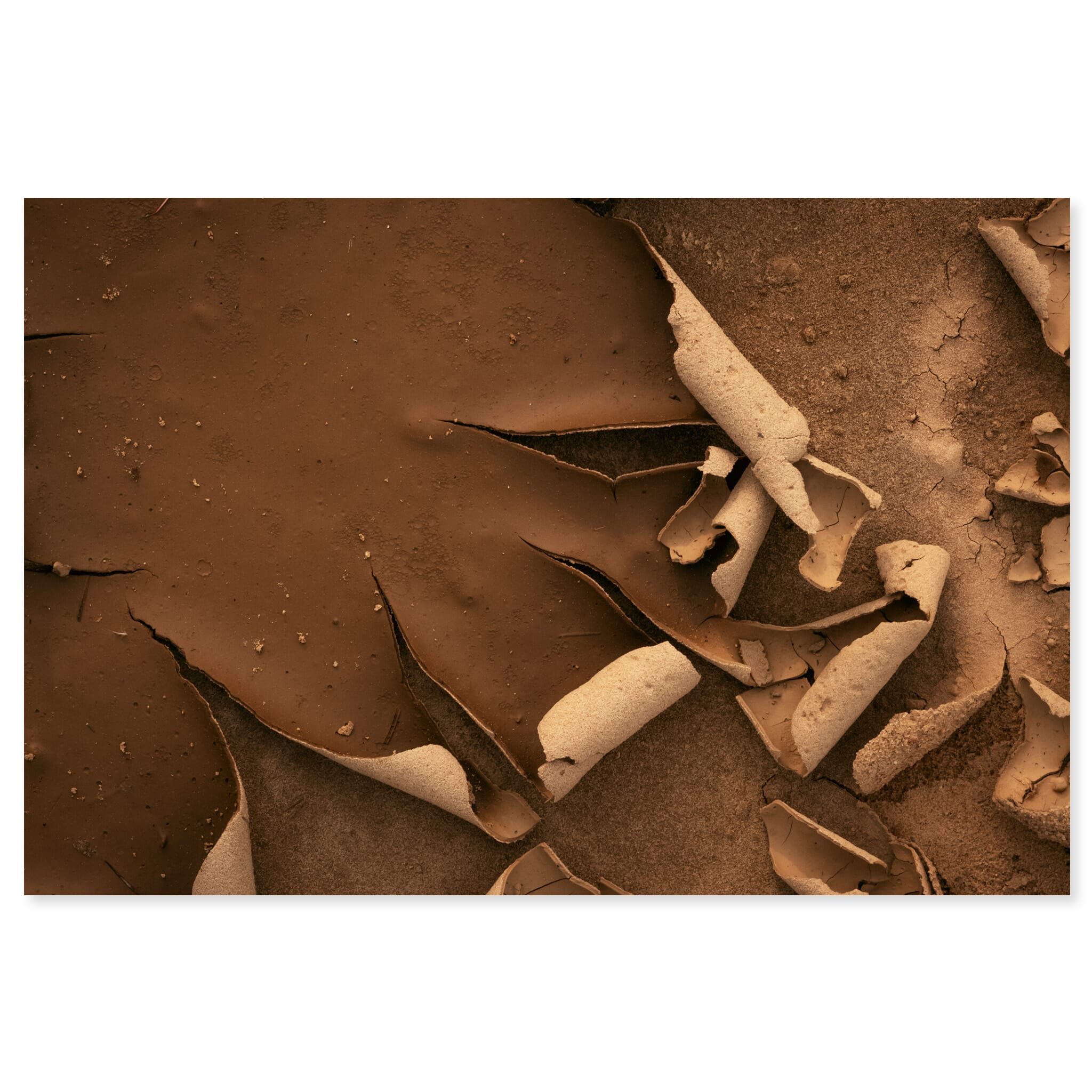 Fine art print of cracked mud texture resembling aged wallpaper in old quarry