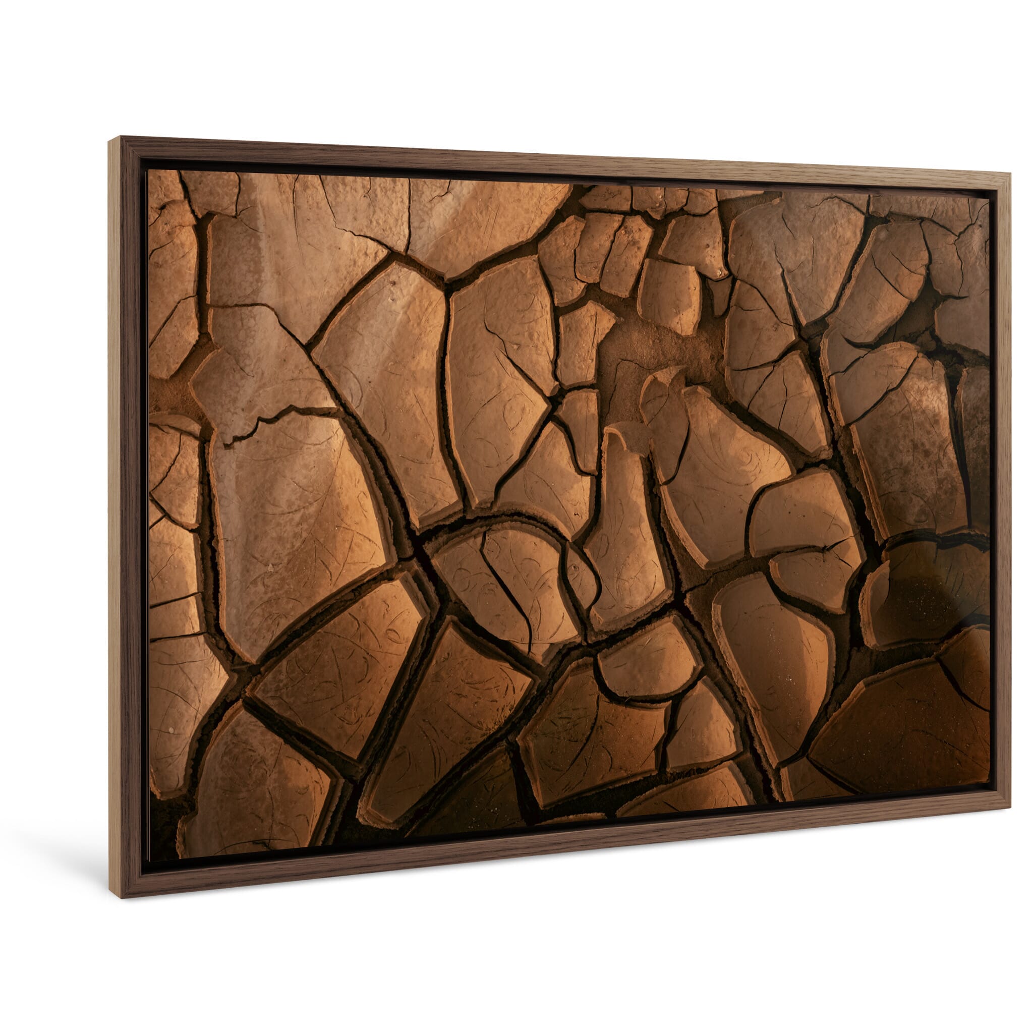 Framed photo print of textured mud with natural cracks and curled edges