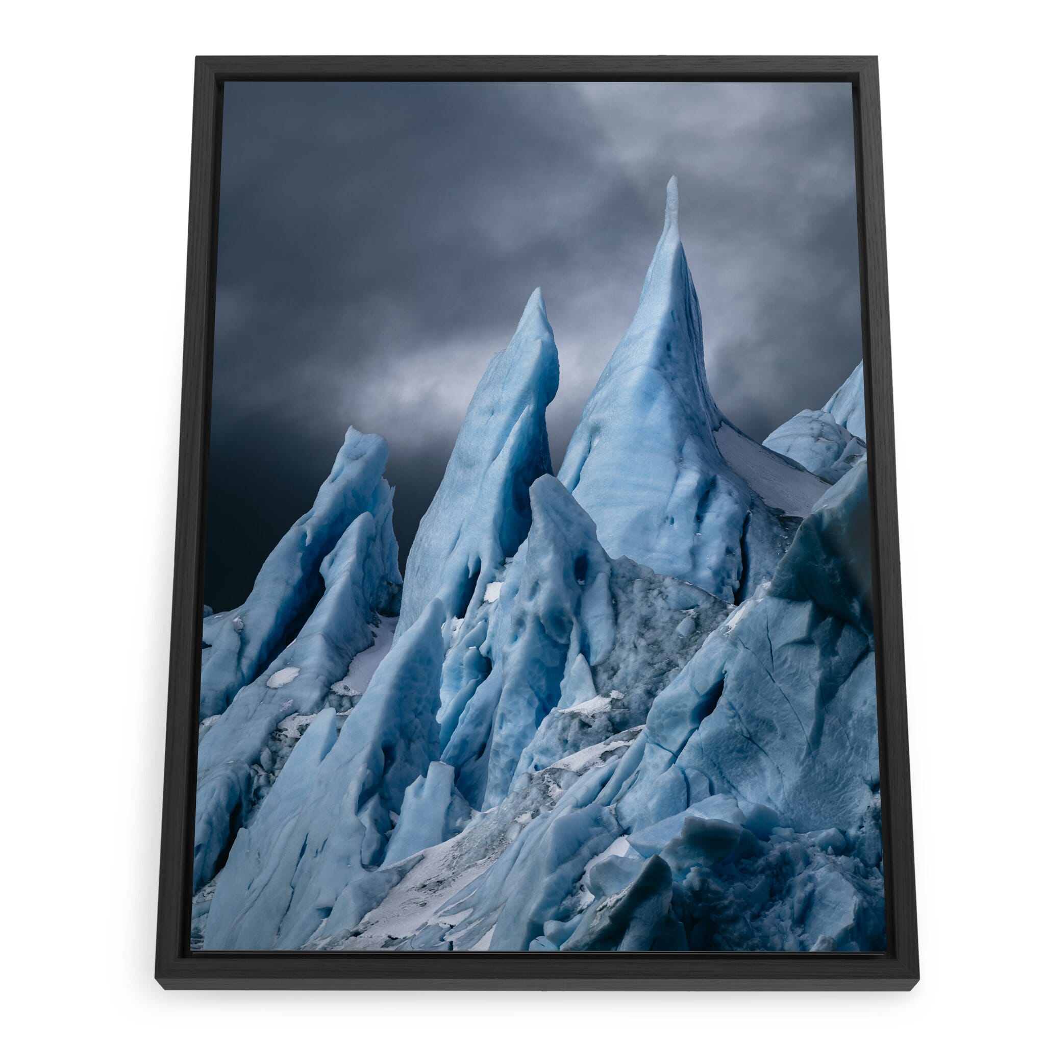 Framed photo print of jagged iceberg under soft winter light