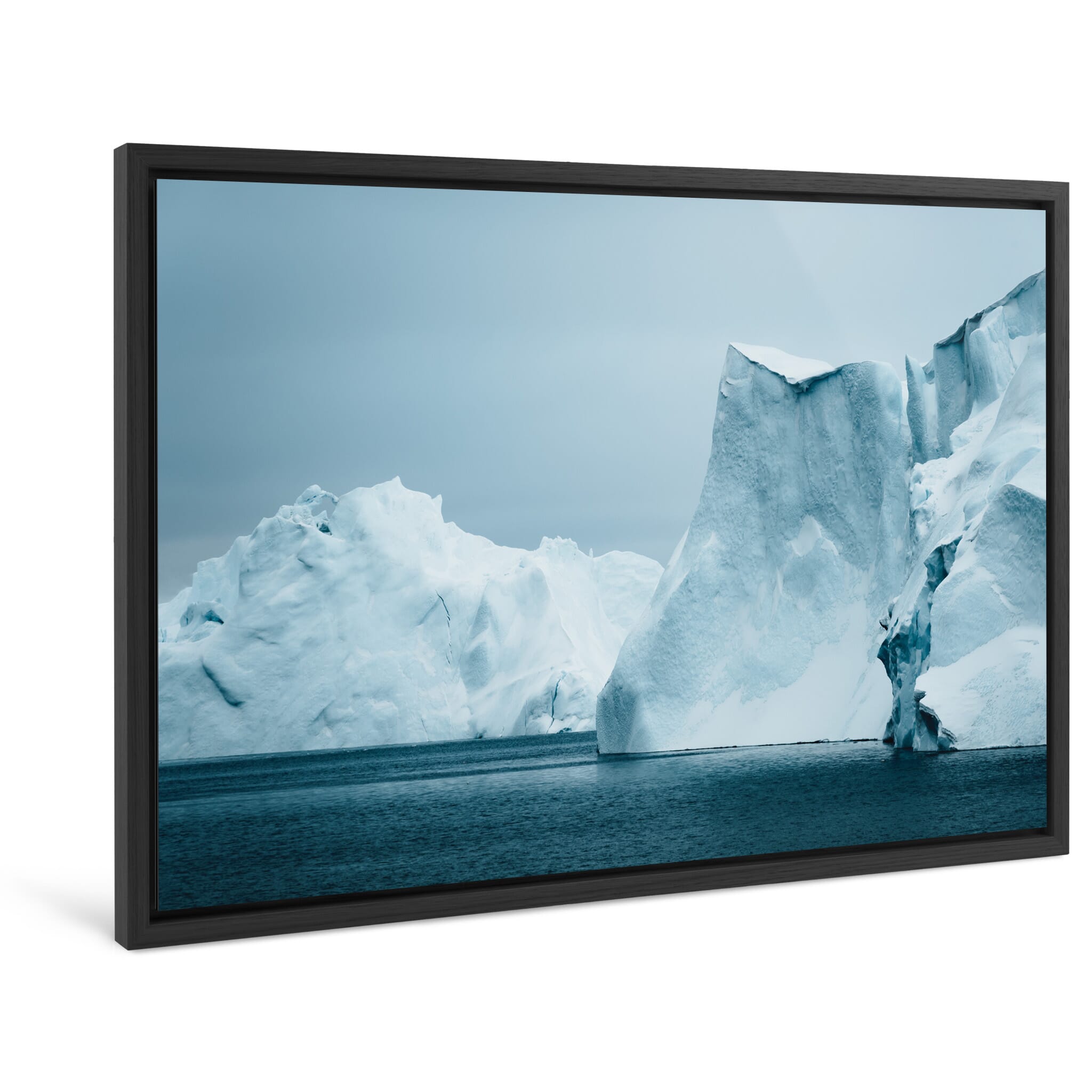 Framed photo print of winter iceberg with subtle blue and white tones