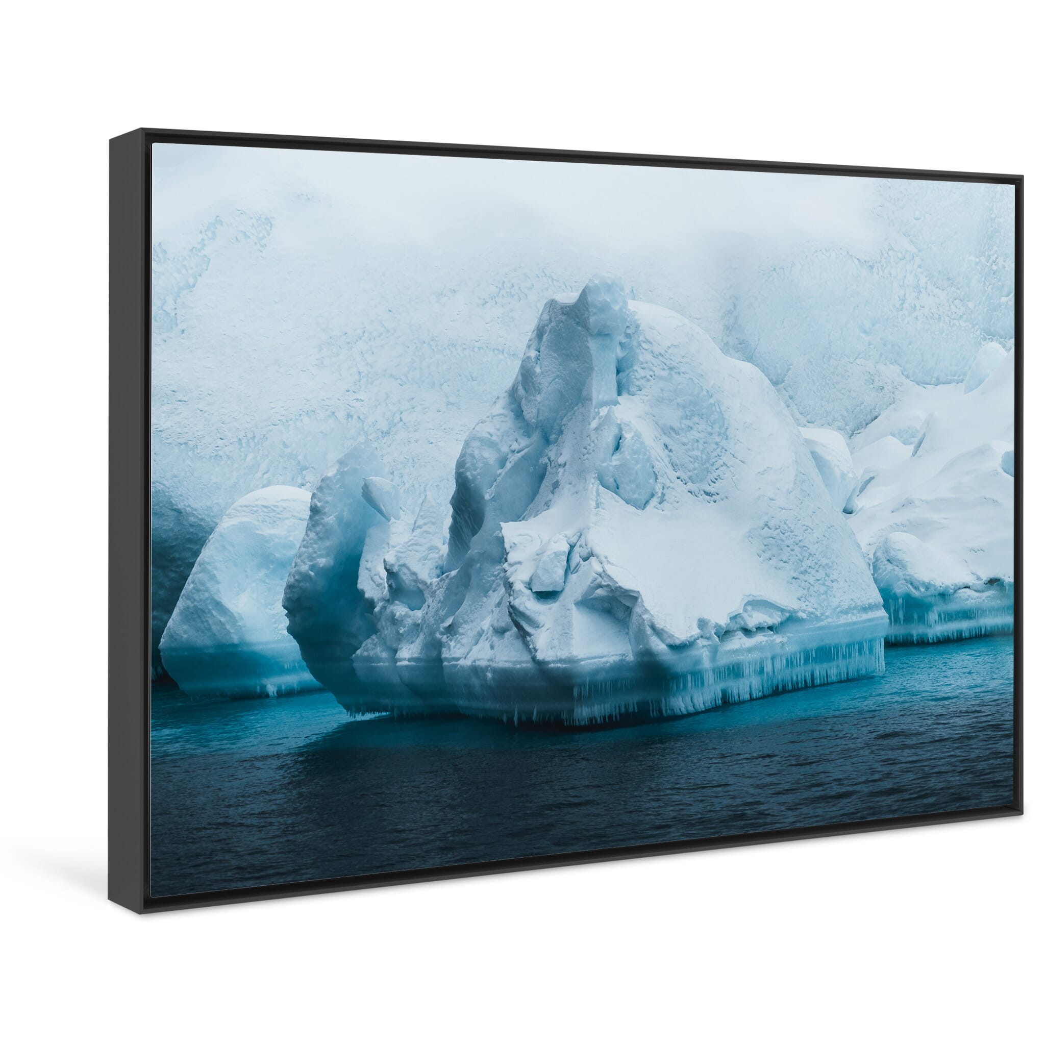 Framed photo print of large iceberg under soft overcast sky