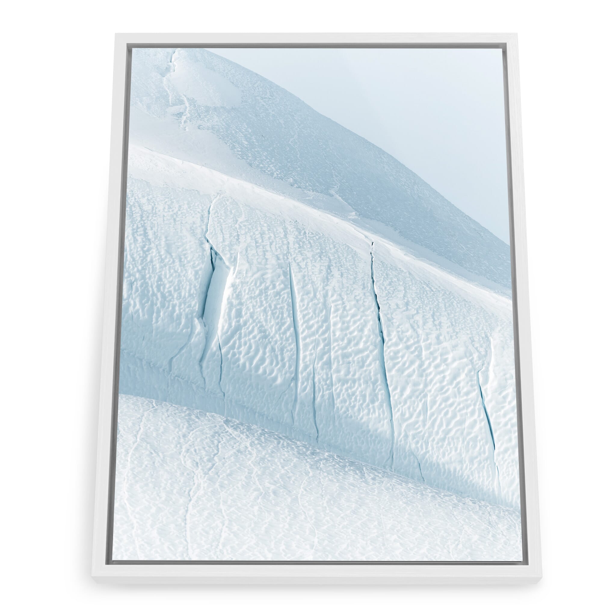 Framed photo print of ice patterns in a monochrome polar scene
