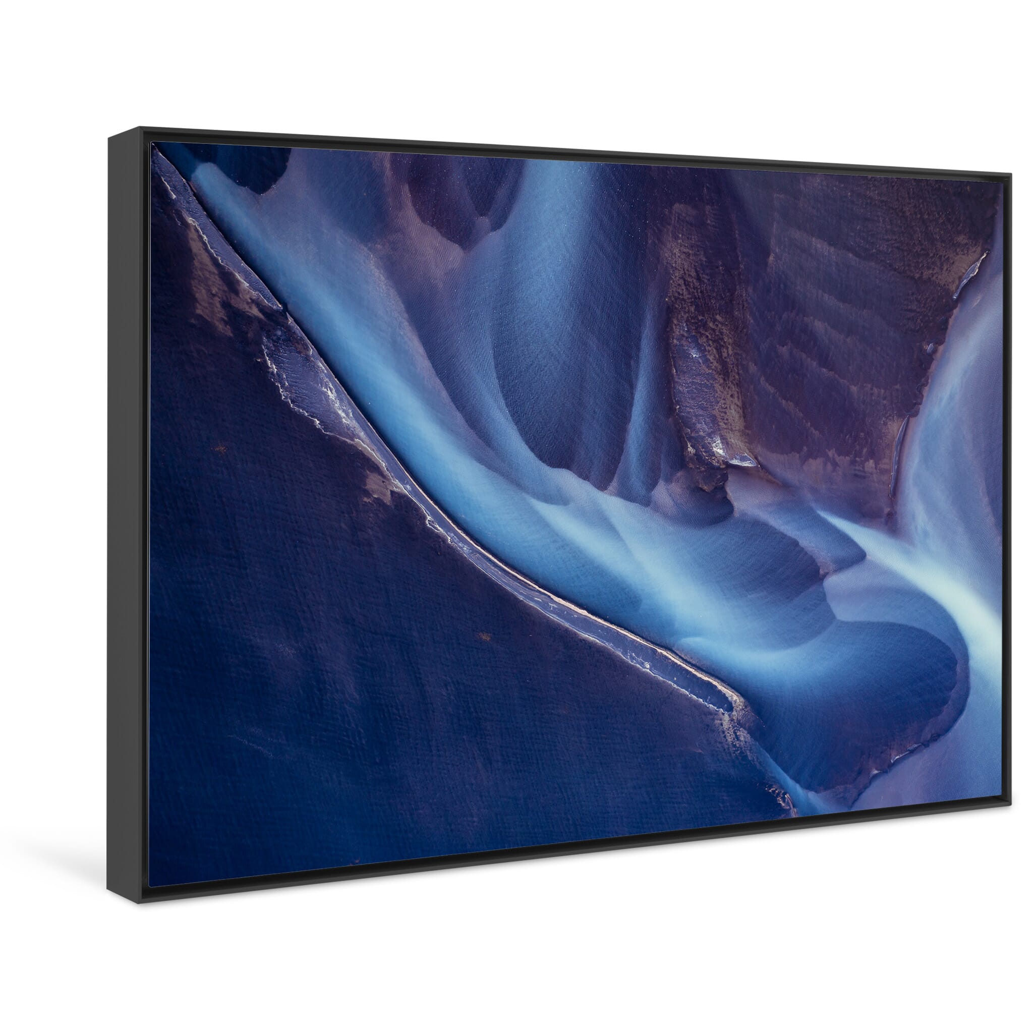 Framed photo print of abstract river shapes formed by sediment-laden currents