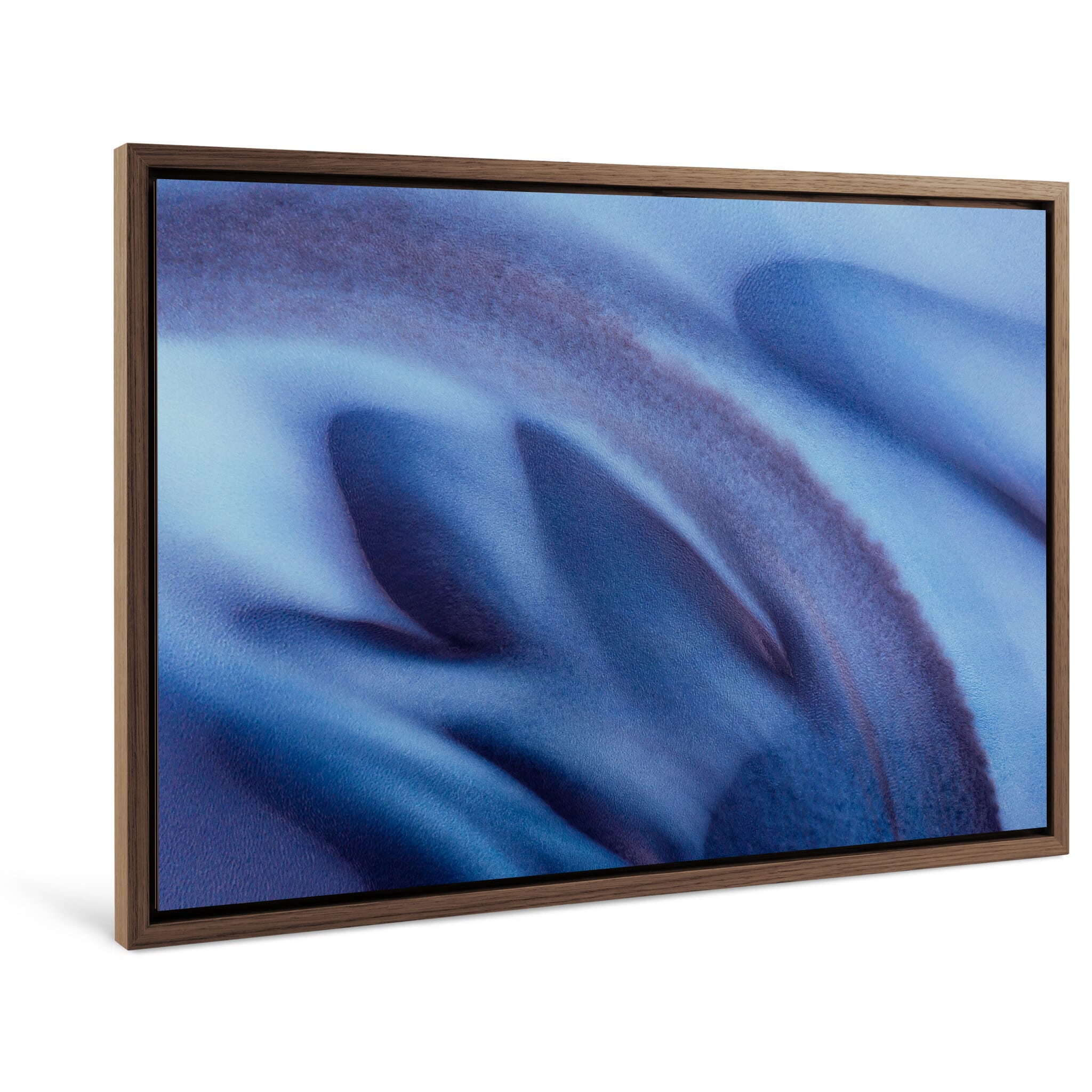 Framed photo print of abstract aerial shapes formed by water flow and sediment