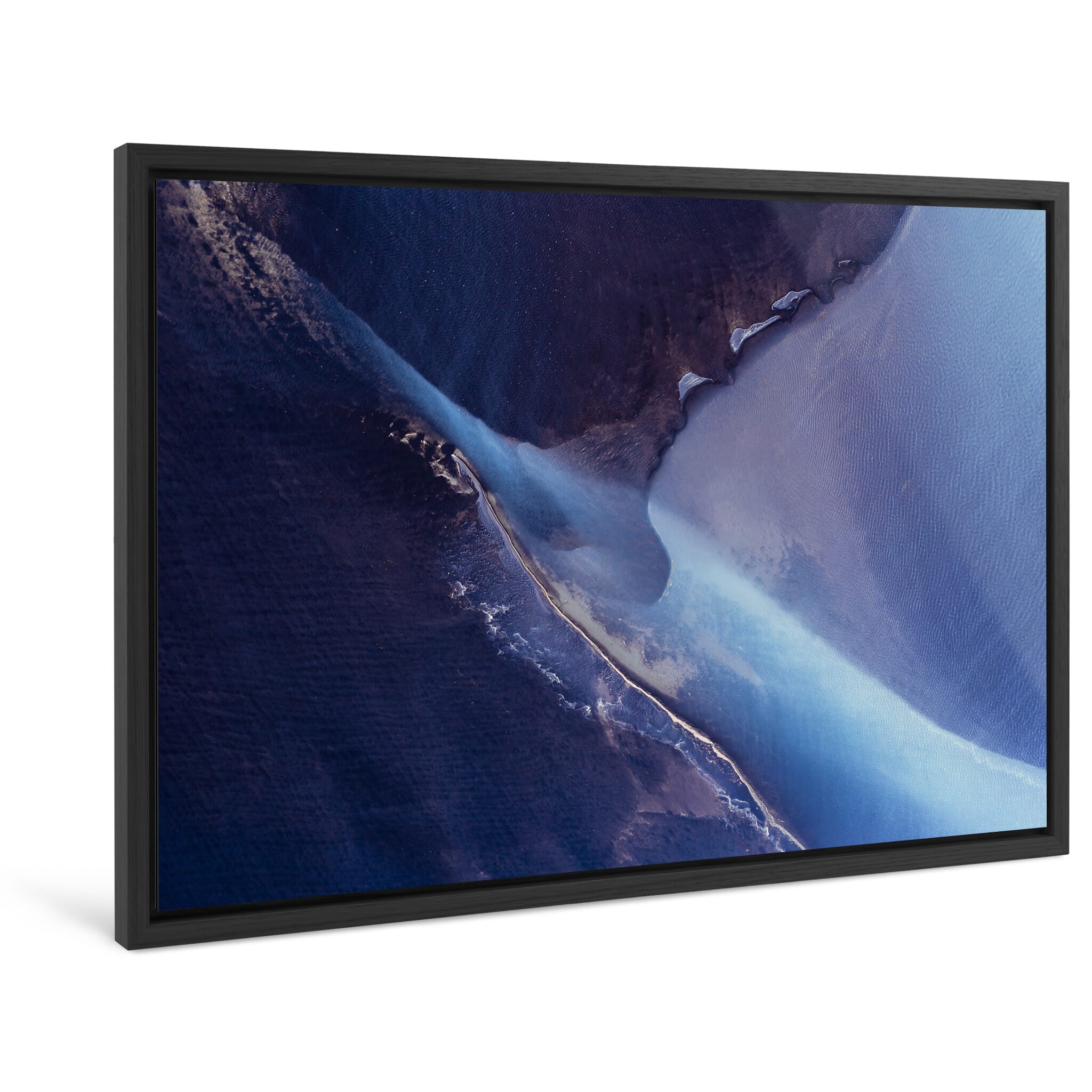 Framed photo print of dynamic water channels revealing bright sediment patterns
