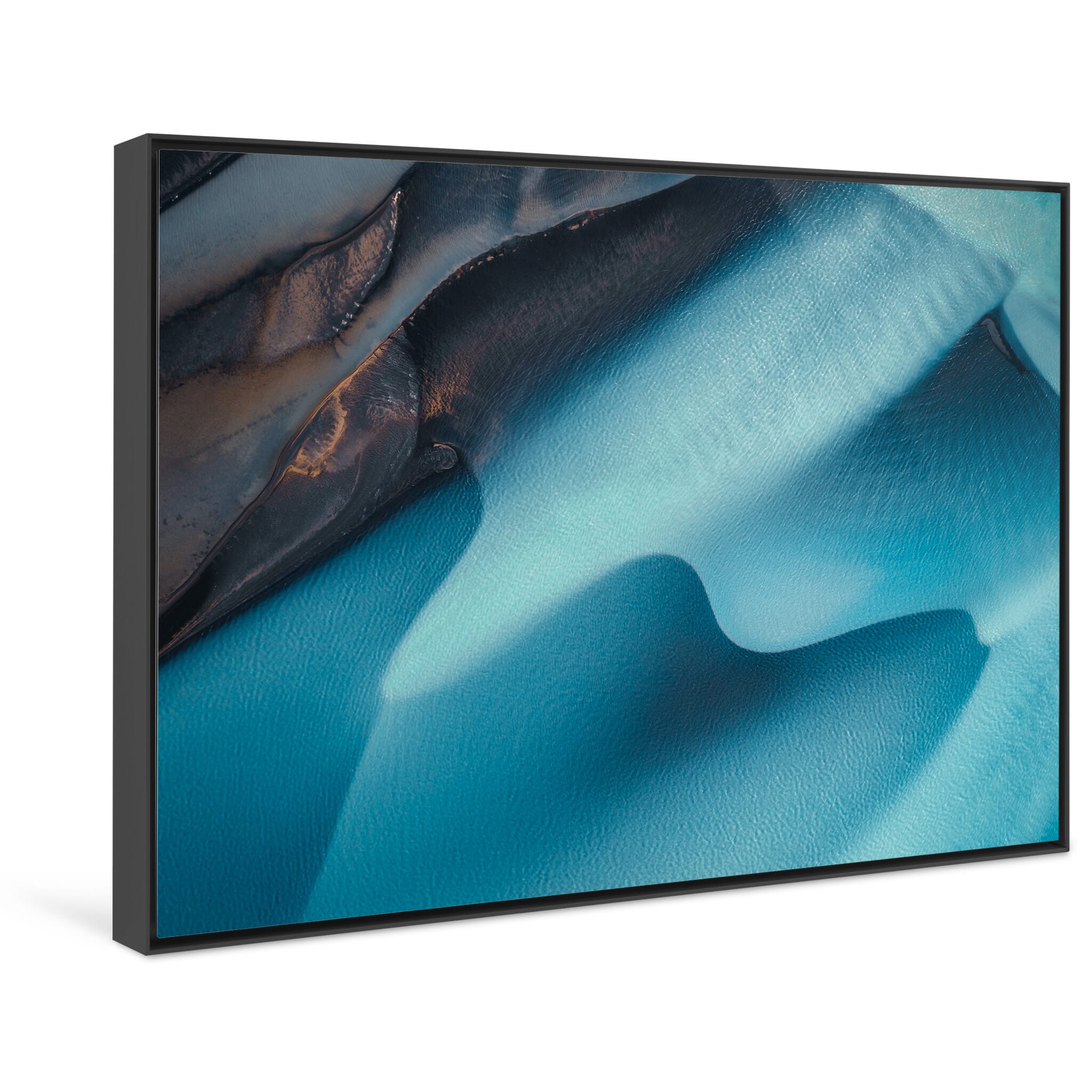 Framed photo print of bold turquoise and deep blue channels shaped by sediment