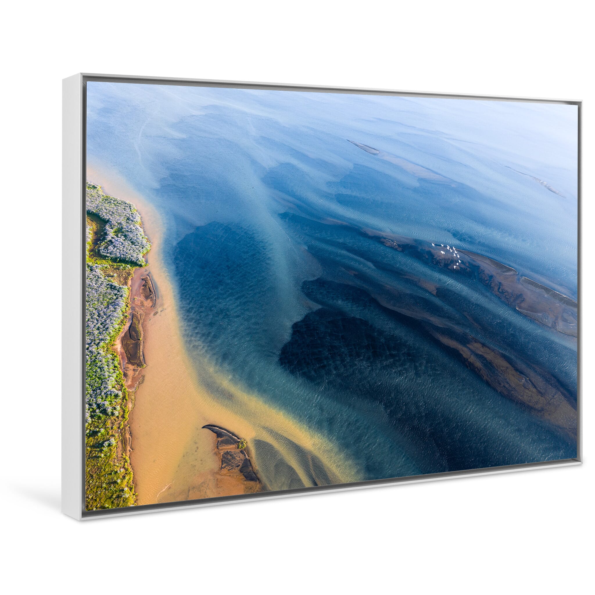 Framed photo print of a constantly changing Icelandic river meeting the ocean