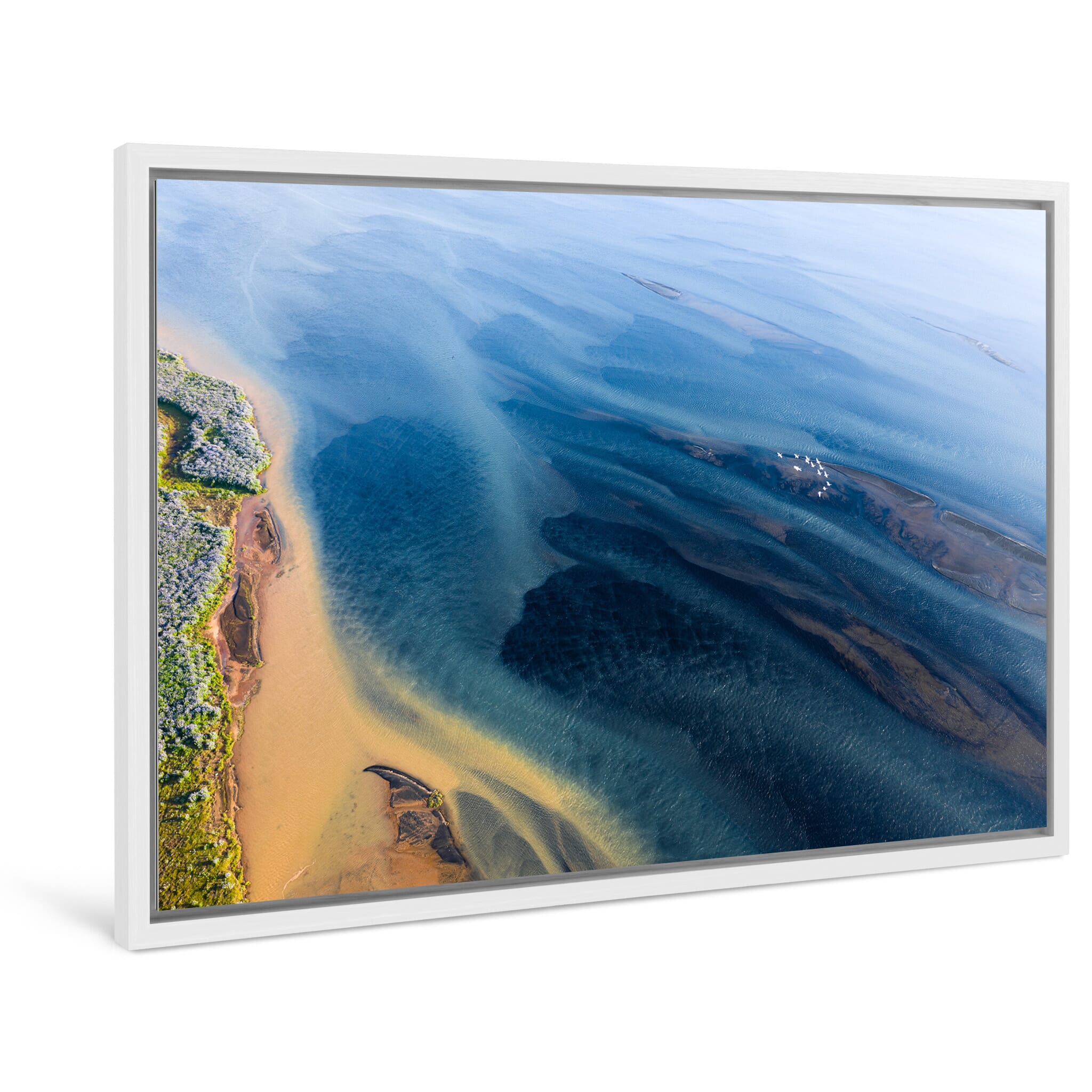 Framed photo print of swirling watercolor-like patterns captured from above