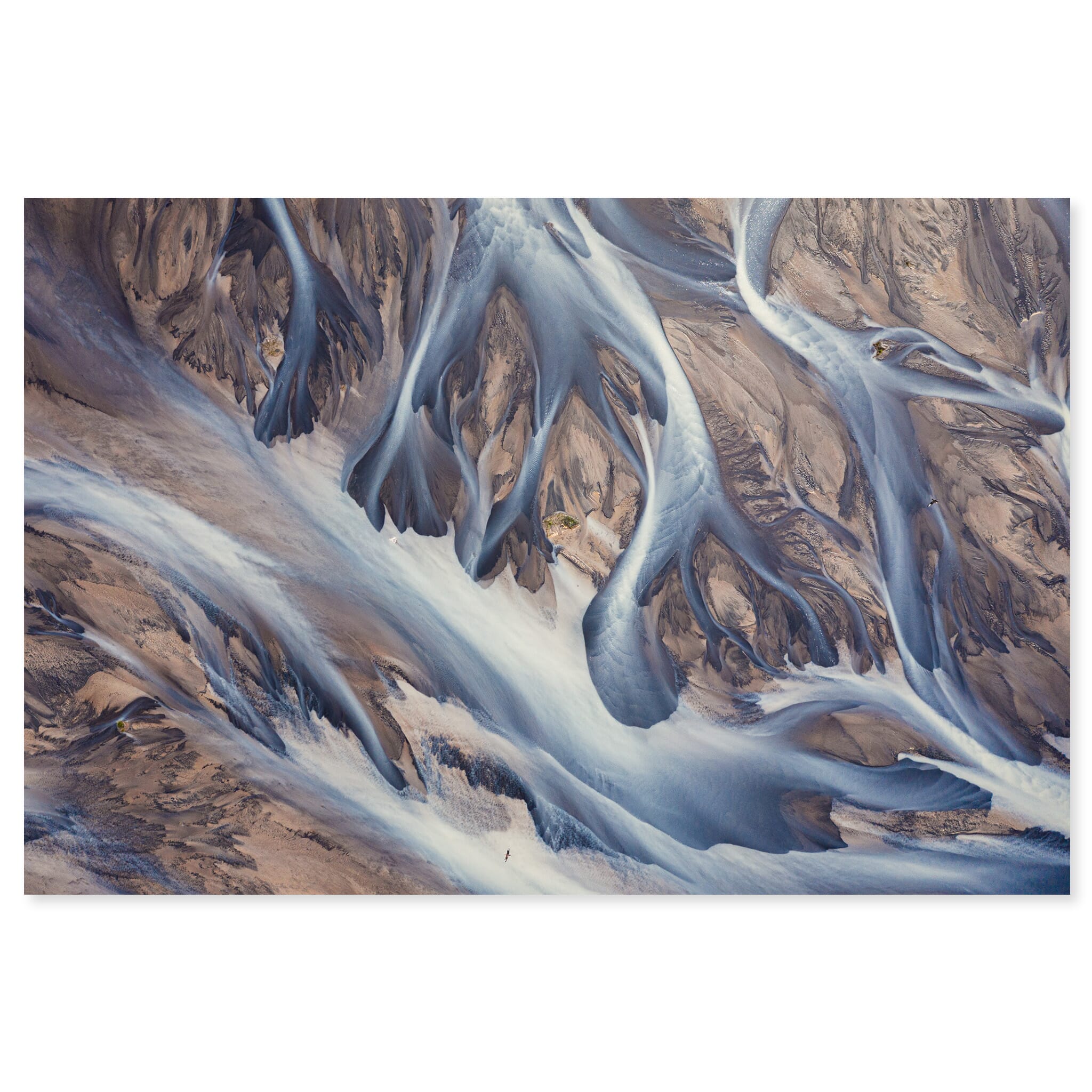 Fine art print of an aerial glacial river in Iceland with brown and blue tones