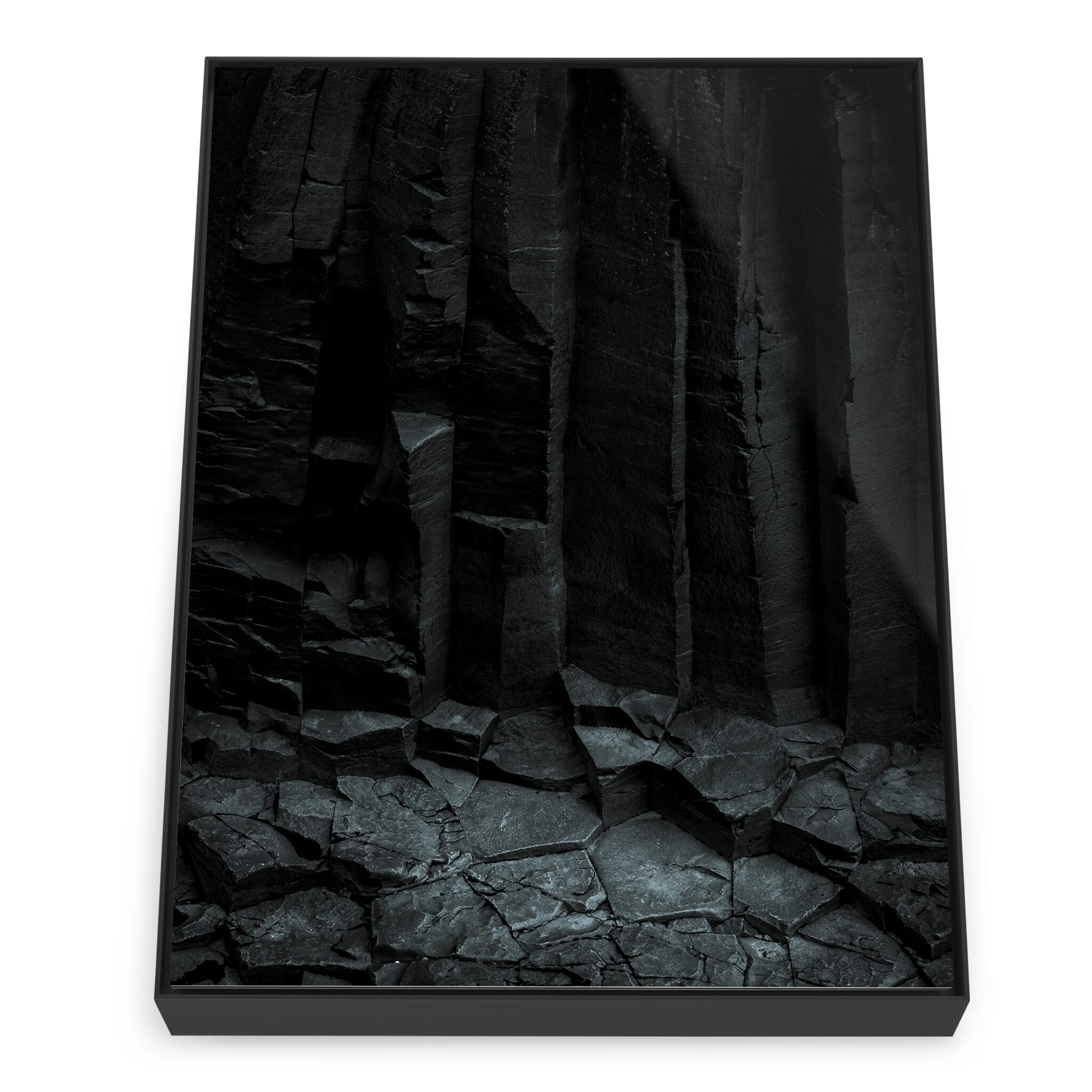 Framed photo print of dramatic rock formations with volcanic origins