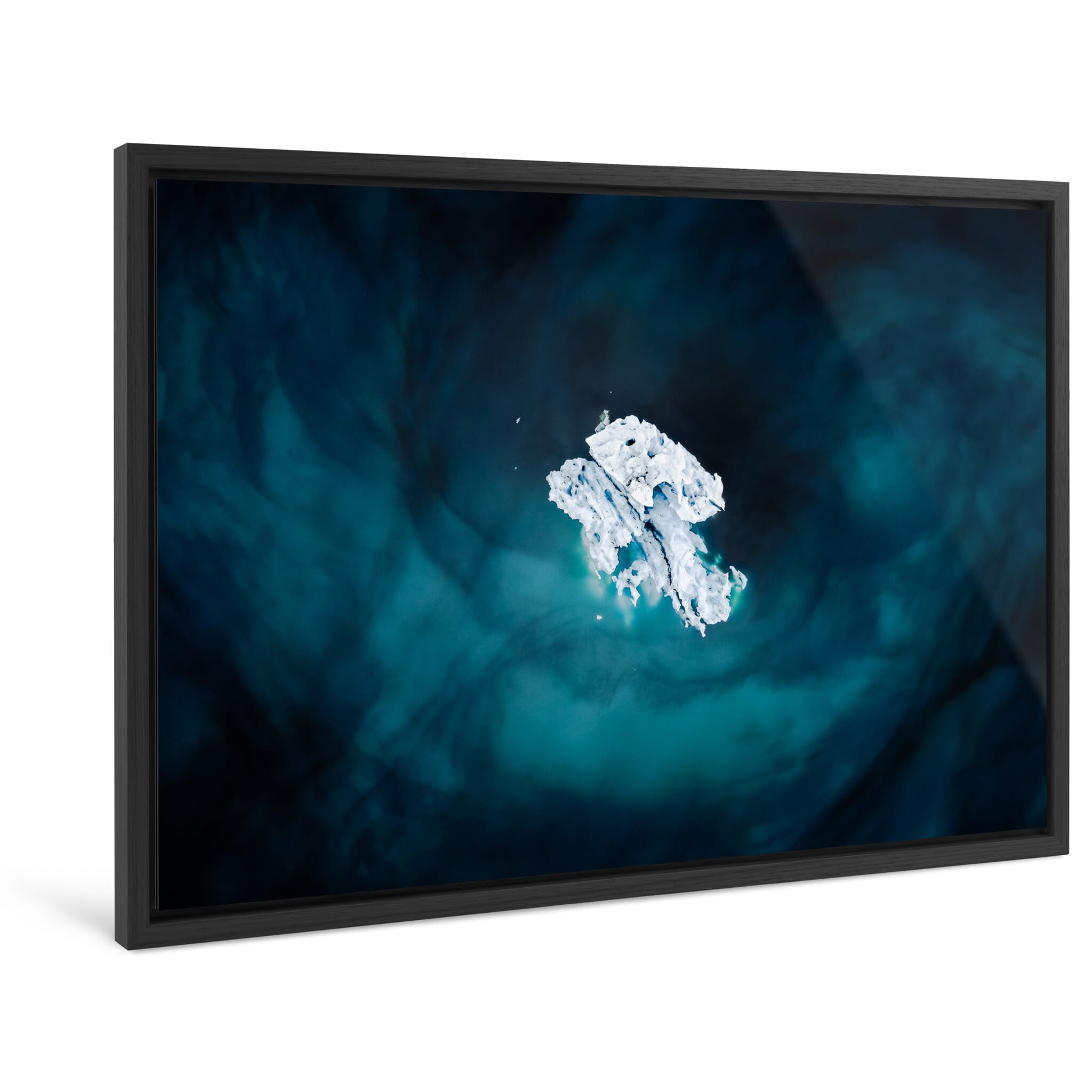 Framed photo print of iceberg fragments shaped by wind and currents