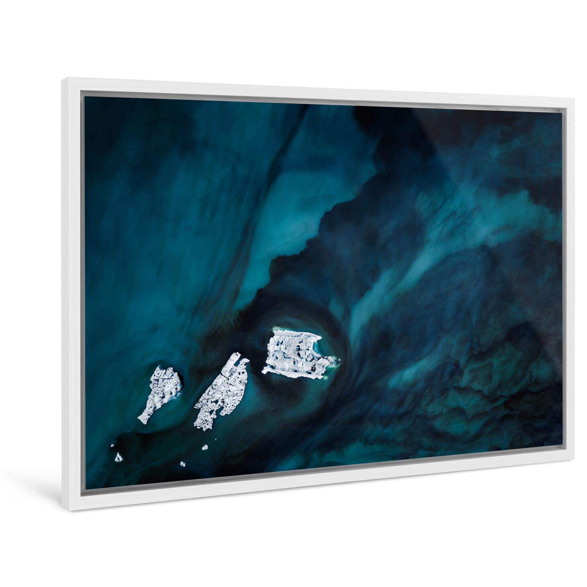 Framed photo print of abstract patterns formed by icebergs and volcanic sand