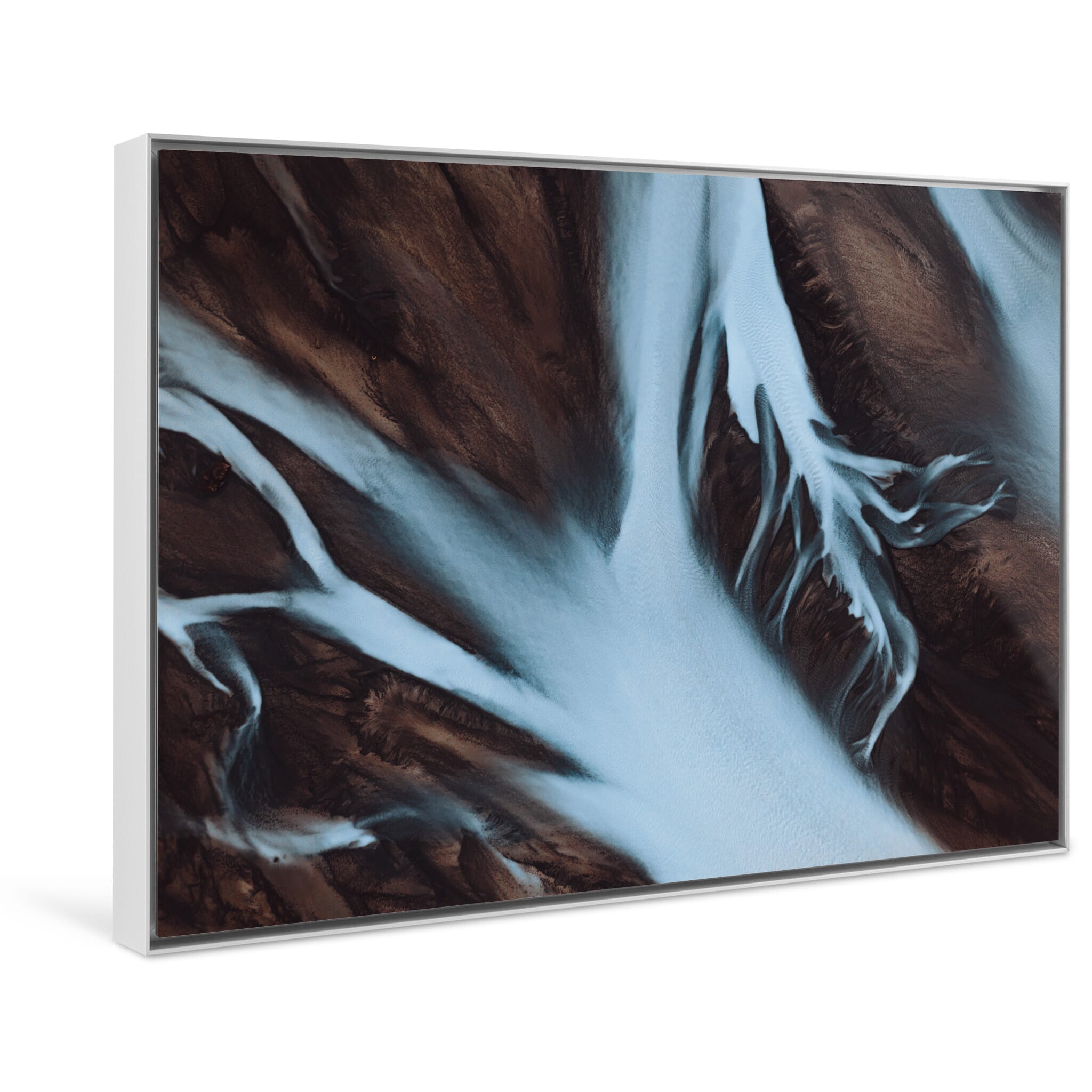 Framed photo print of glacier-fed waterways forming striking contrasts from above