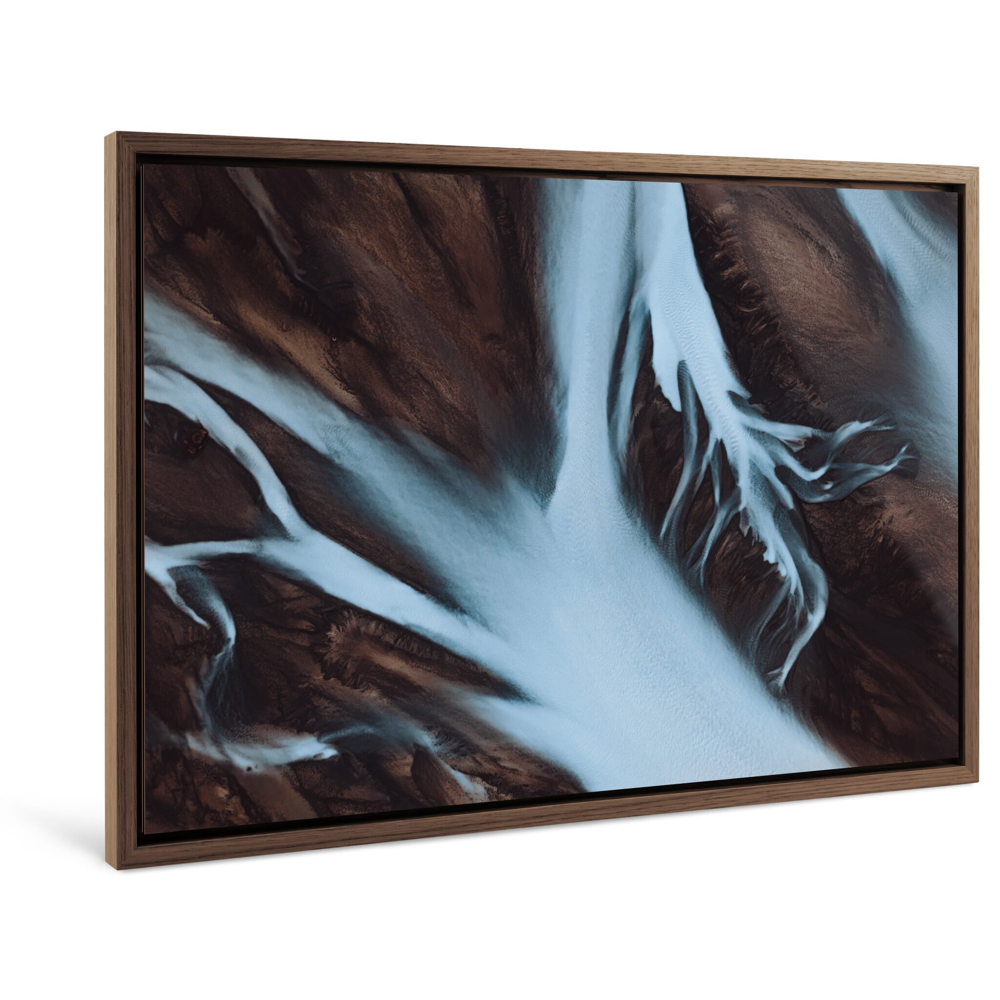 Framed photo print of deep blue water channels across earthy Icelandic landscape