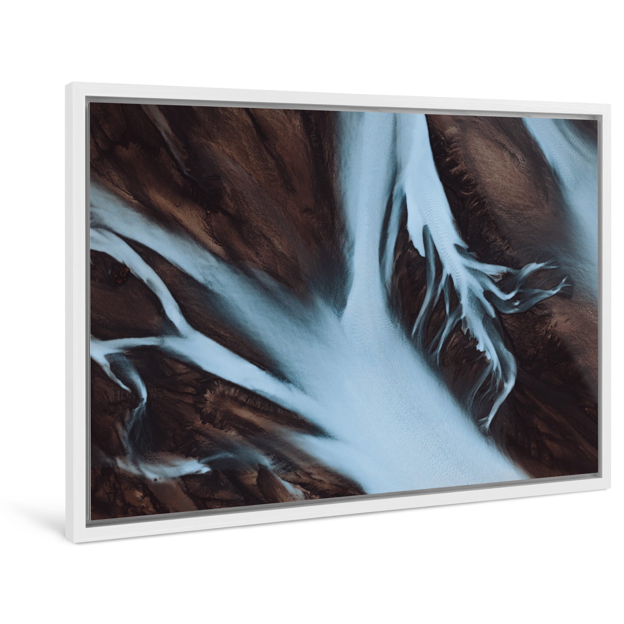 Framed photo print of abstract river patterns shaped by sediment and flow