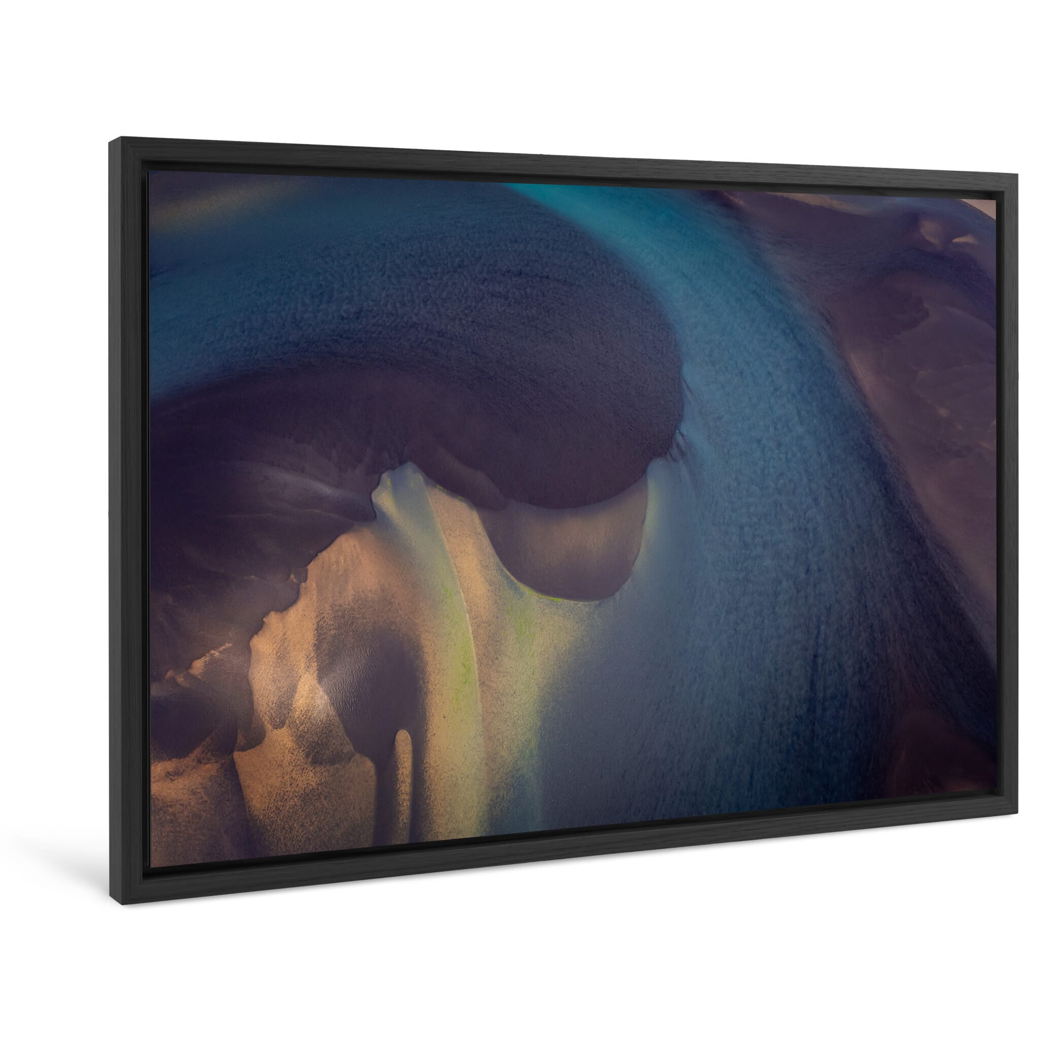 Framed photo print of braided river channels with vibrant earth tones seen from above