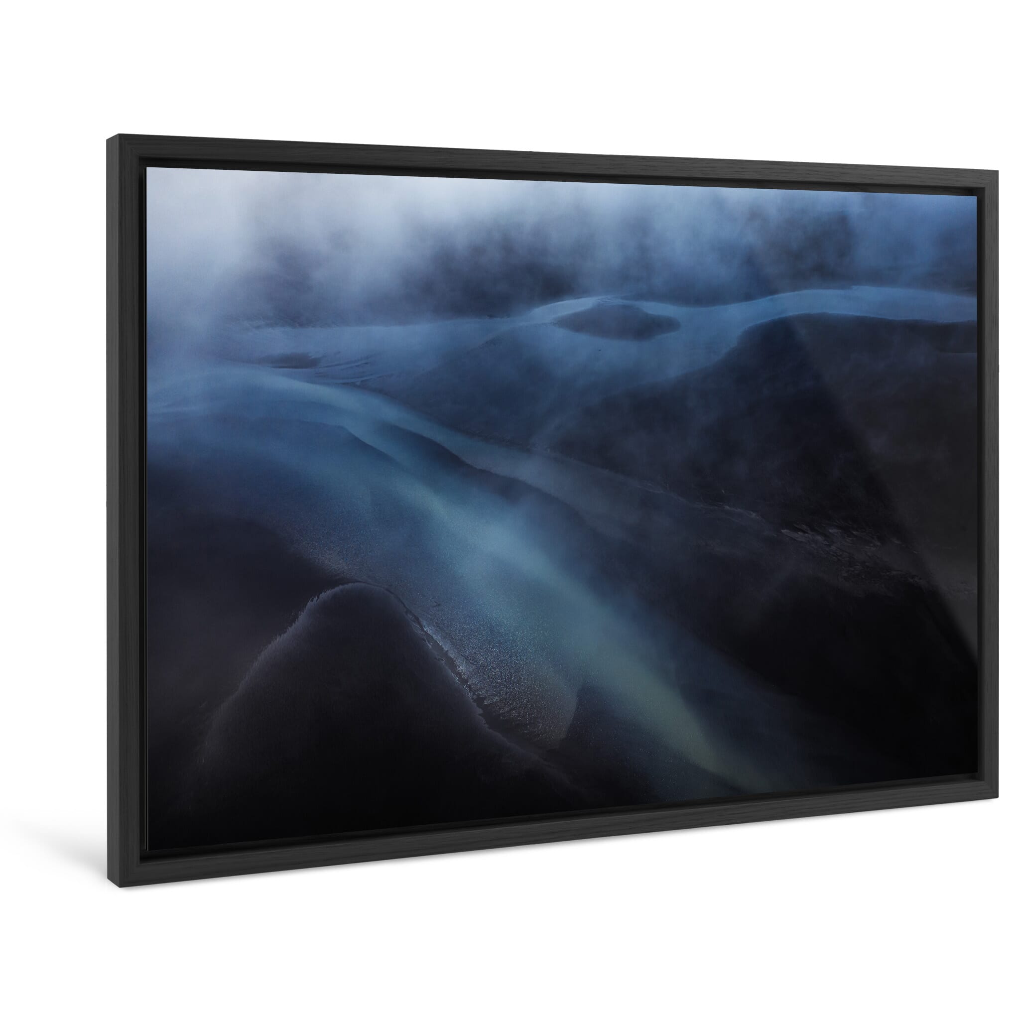 Framed photo print of subtle shapes formed by sediment in low evening light