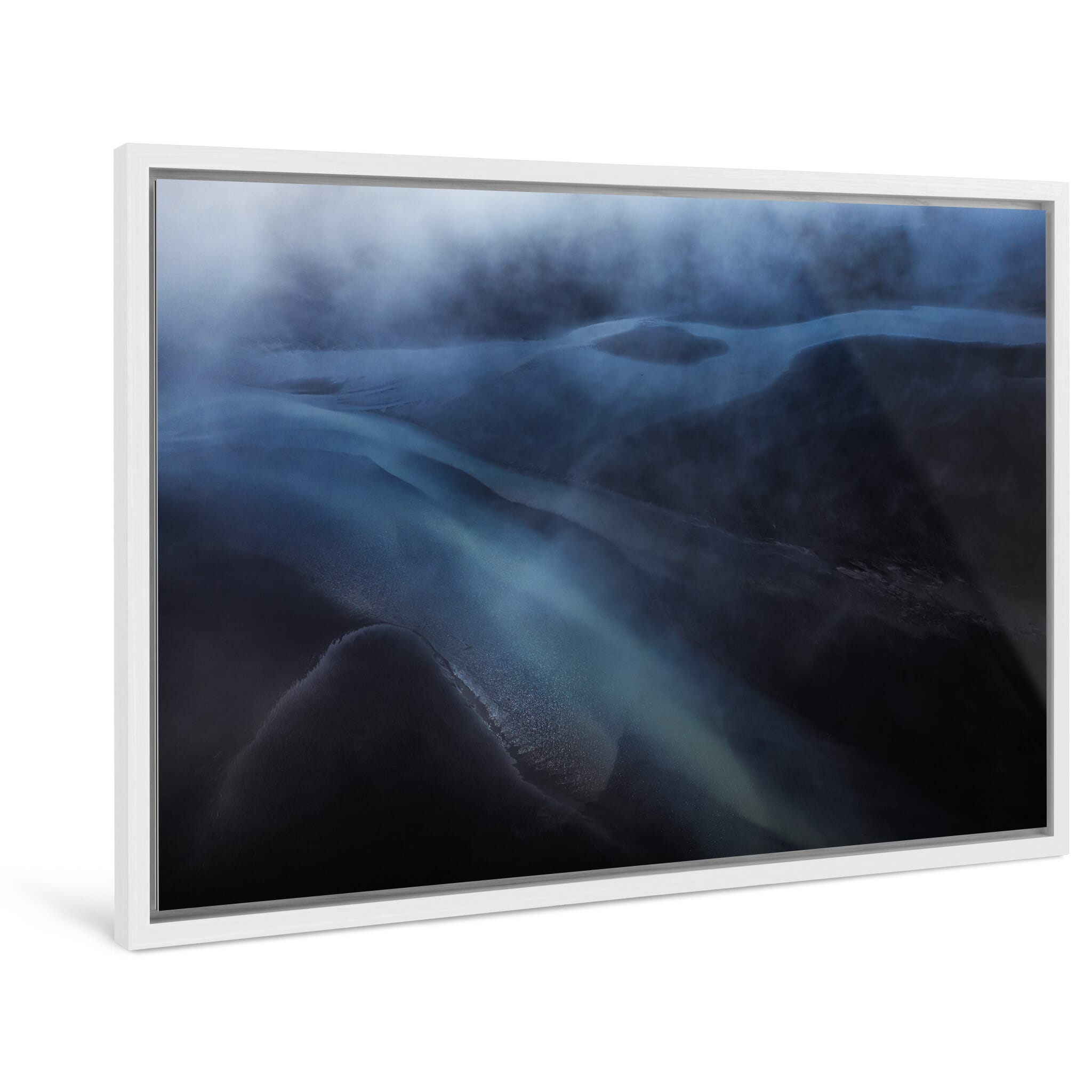 Framed photo print of shifting clouds over a glacier river captured at dusk