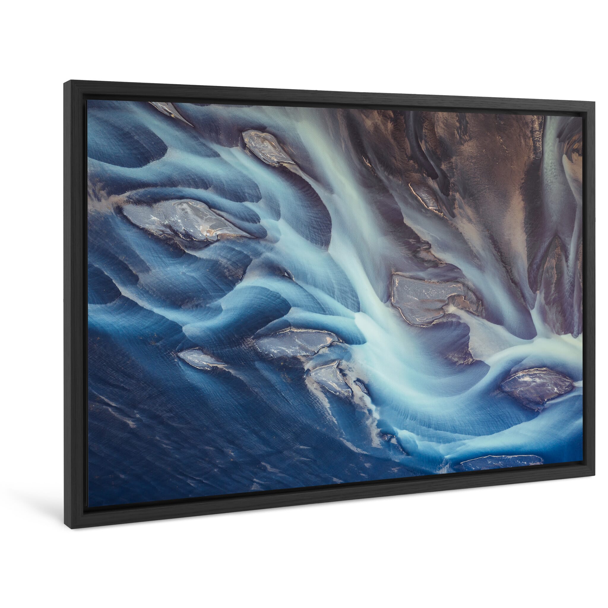 Framed photo print of abstract aerial view of glacier-fed river with sediment patterns