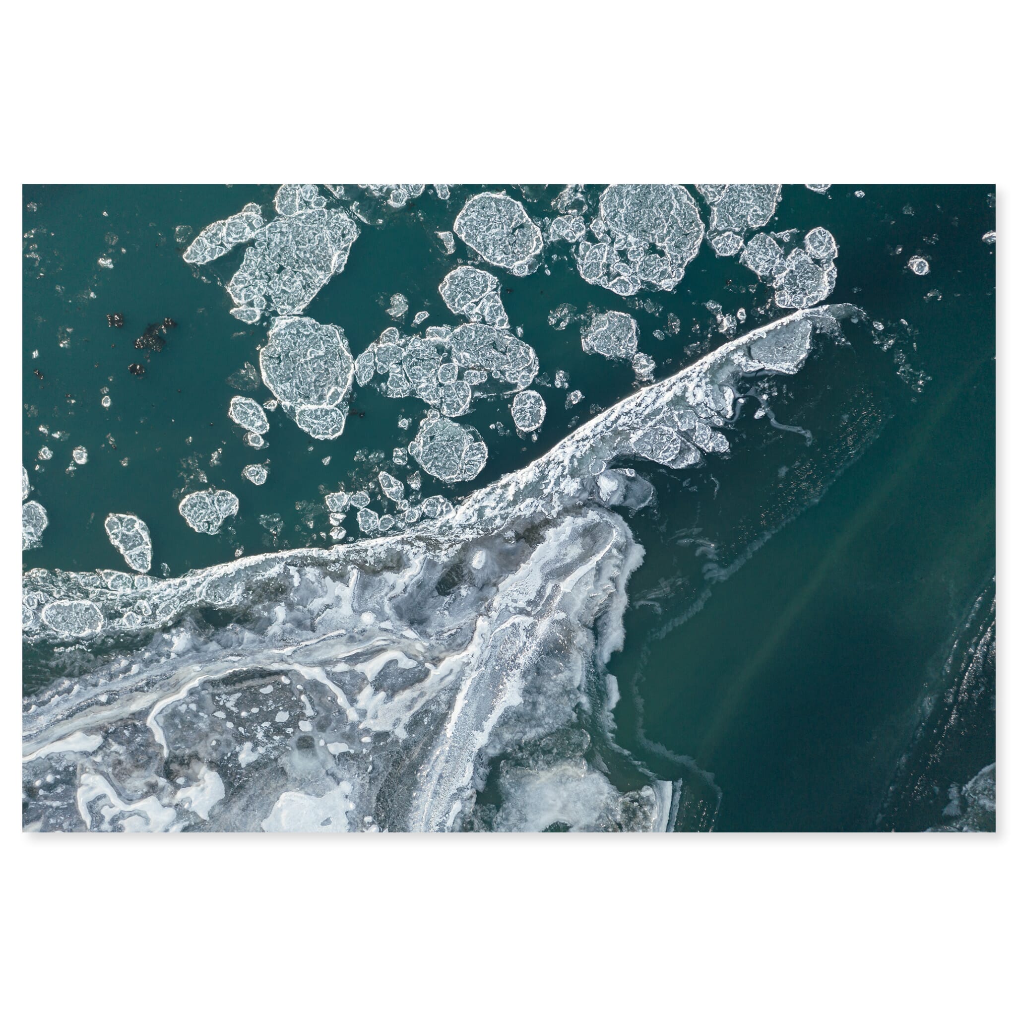 Fine art print of drifting ice floes on a frozen river in Iceland