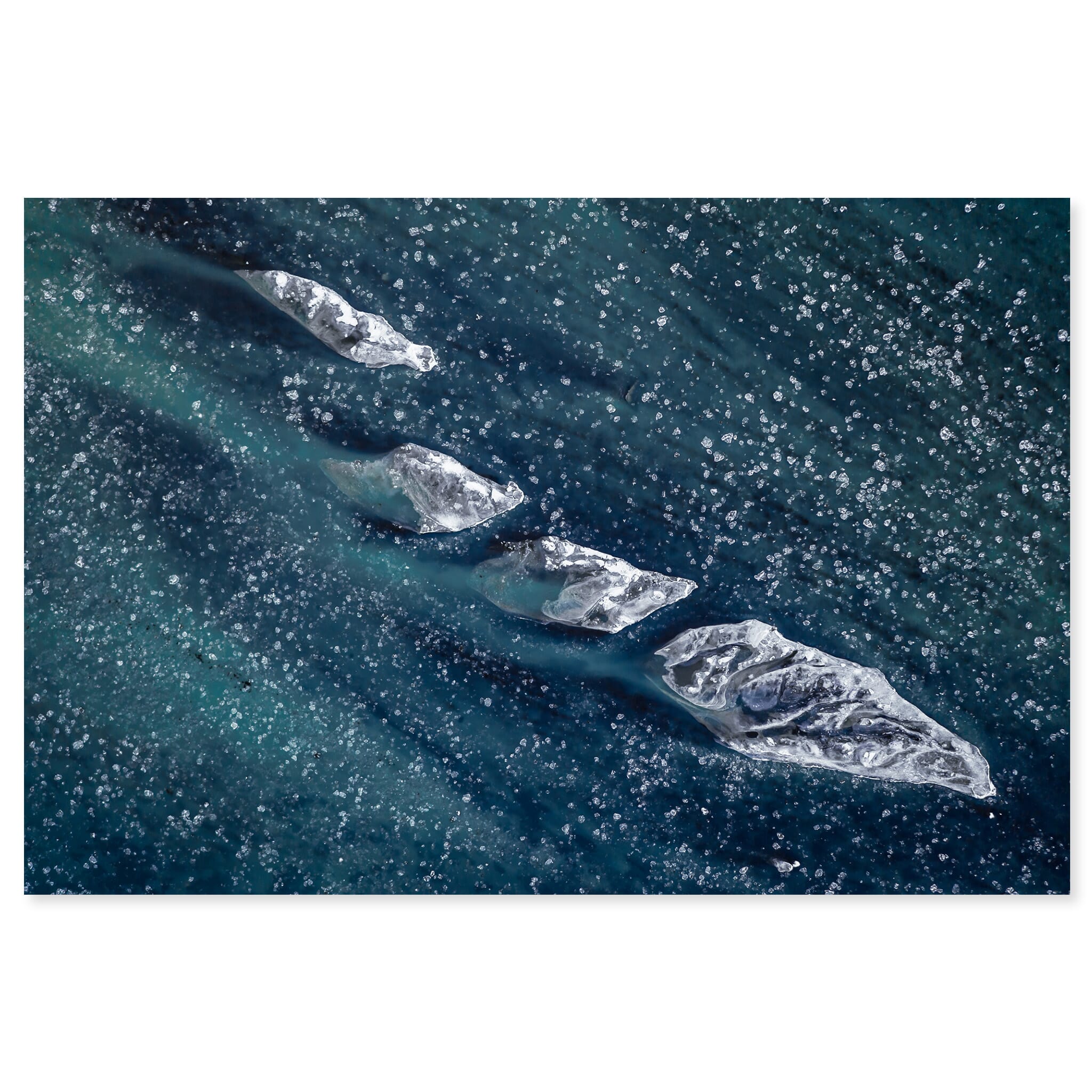 Fine art print of drifting ice floes on a frozen glacial river in Iceland