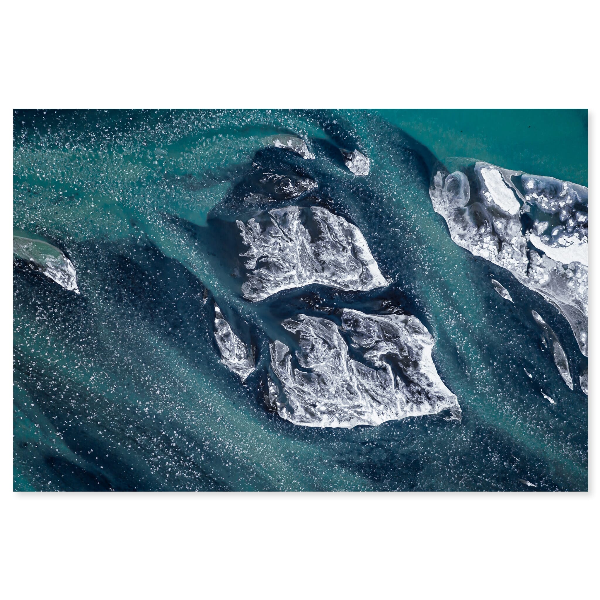 Fine art print of drifting ice floes on a frozen glacial river in Iceland