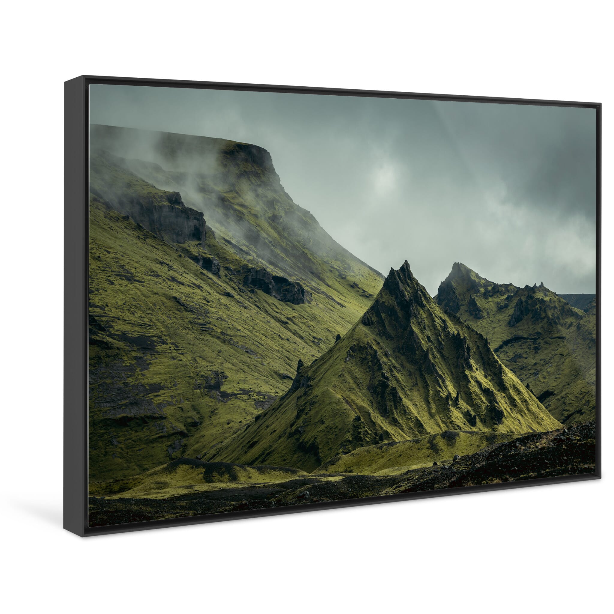 Framed photo print of dark volcanic slopes with green moss and soft light
