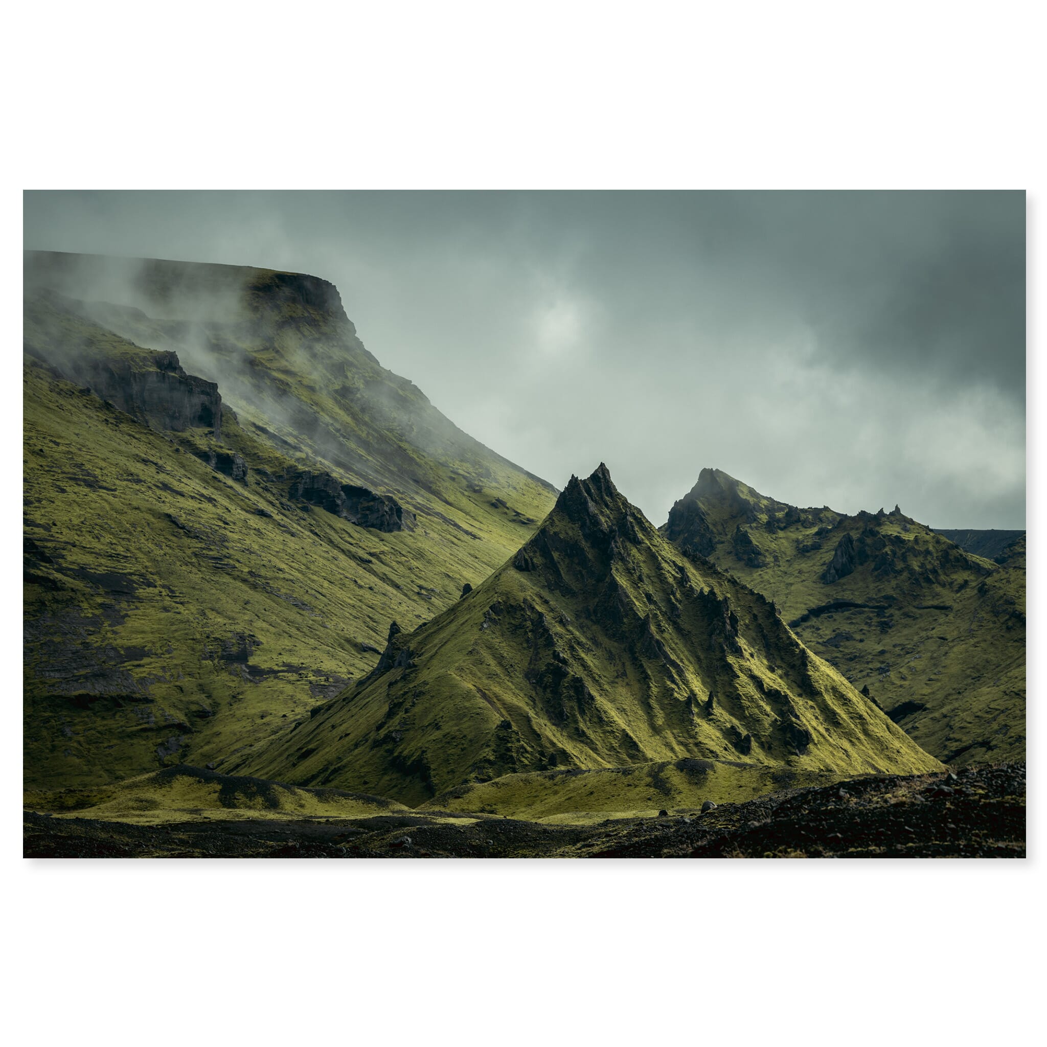 Fine art print of dramatic moss-covered mountain under the clouds