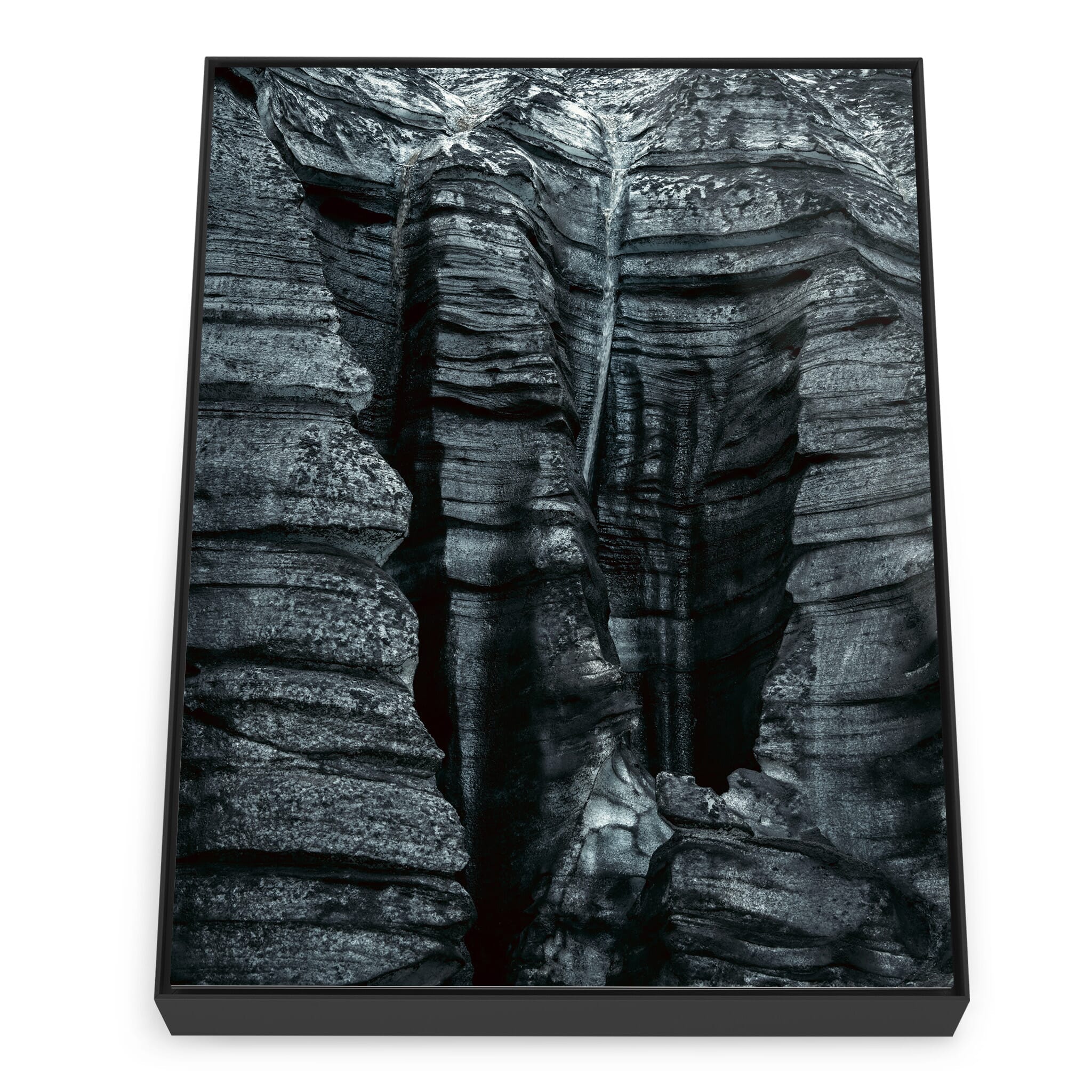 Framed photo print of ash-covered glacier with rugged ice formations