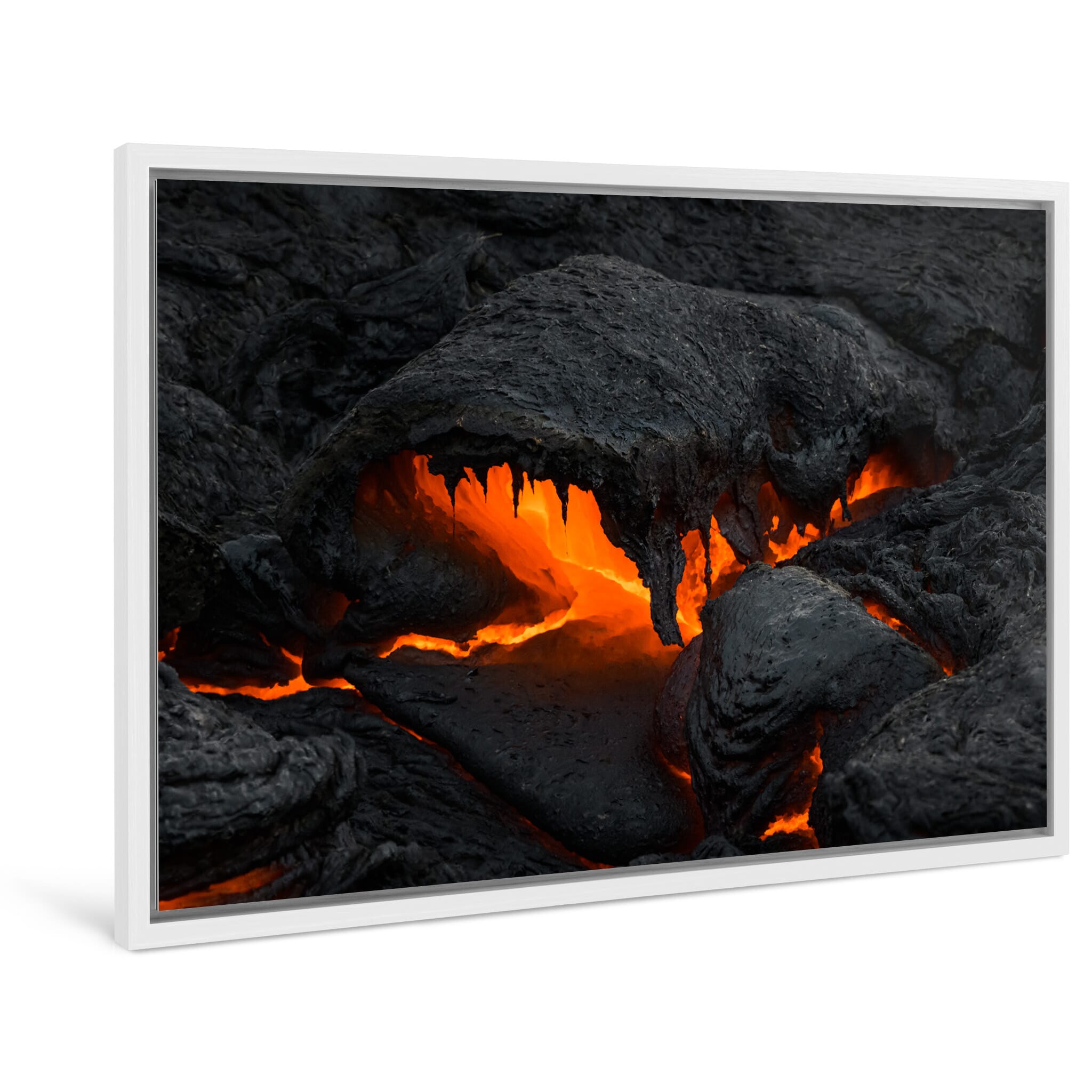 Framed photo print of cooled lava cracking open to reveal glowing magma